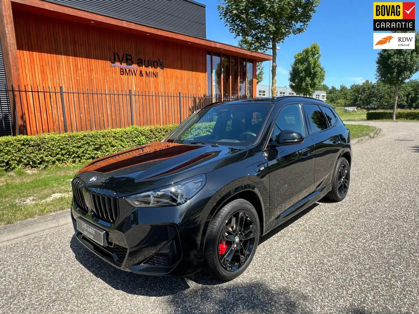 BMW X1 XDrive30e M-sport pro, panoramadak, HUD, H&K, came Zwart - 1