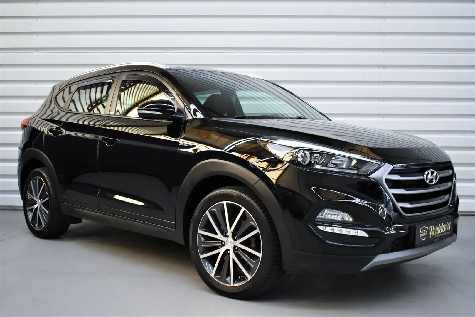 Hyundai TUCSON blue Passion AUTOMATIK*CARPLAY*KAMERA*8FACH*AHK Schwarz - 1