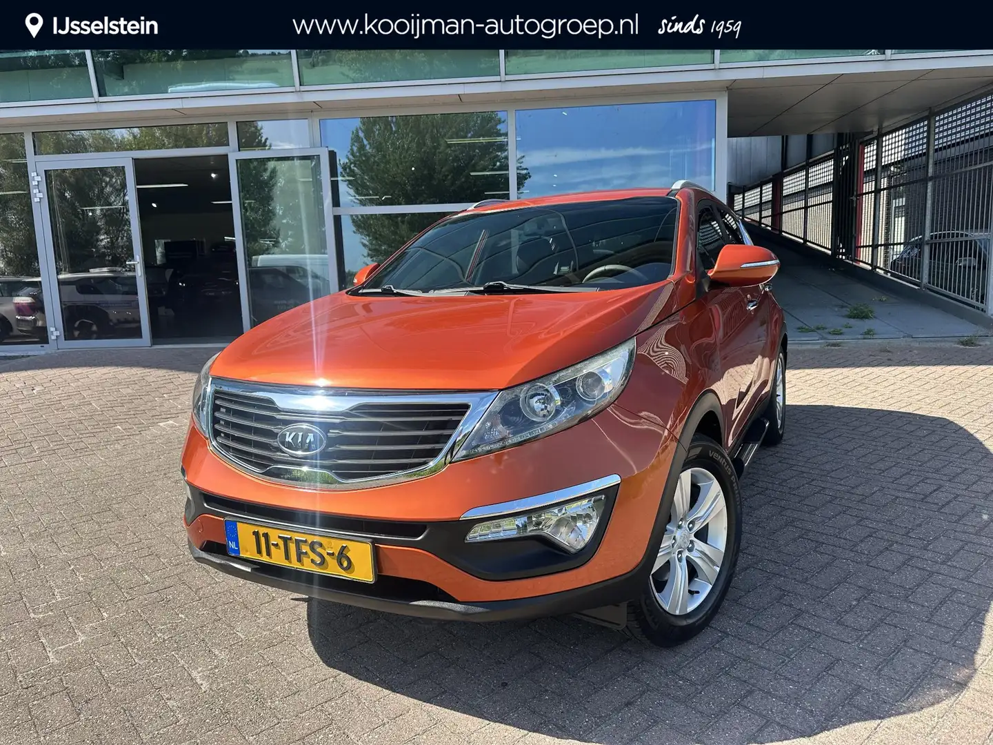 Kia Sportage 1.6 GDI X-ecutive Plus Pack Trekhaak | Dealeronder Oranje - 1
