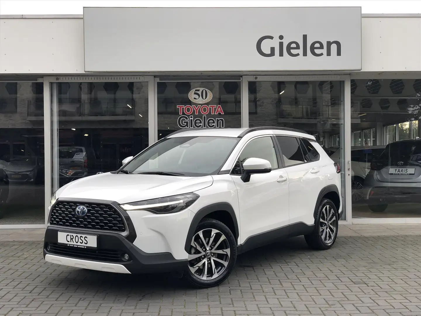 Toyota Corolla Cross 2.0 High Power Hybrid AWD Style | Dodehoekherkenni Wit - 1