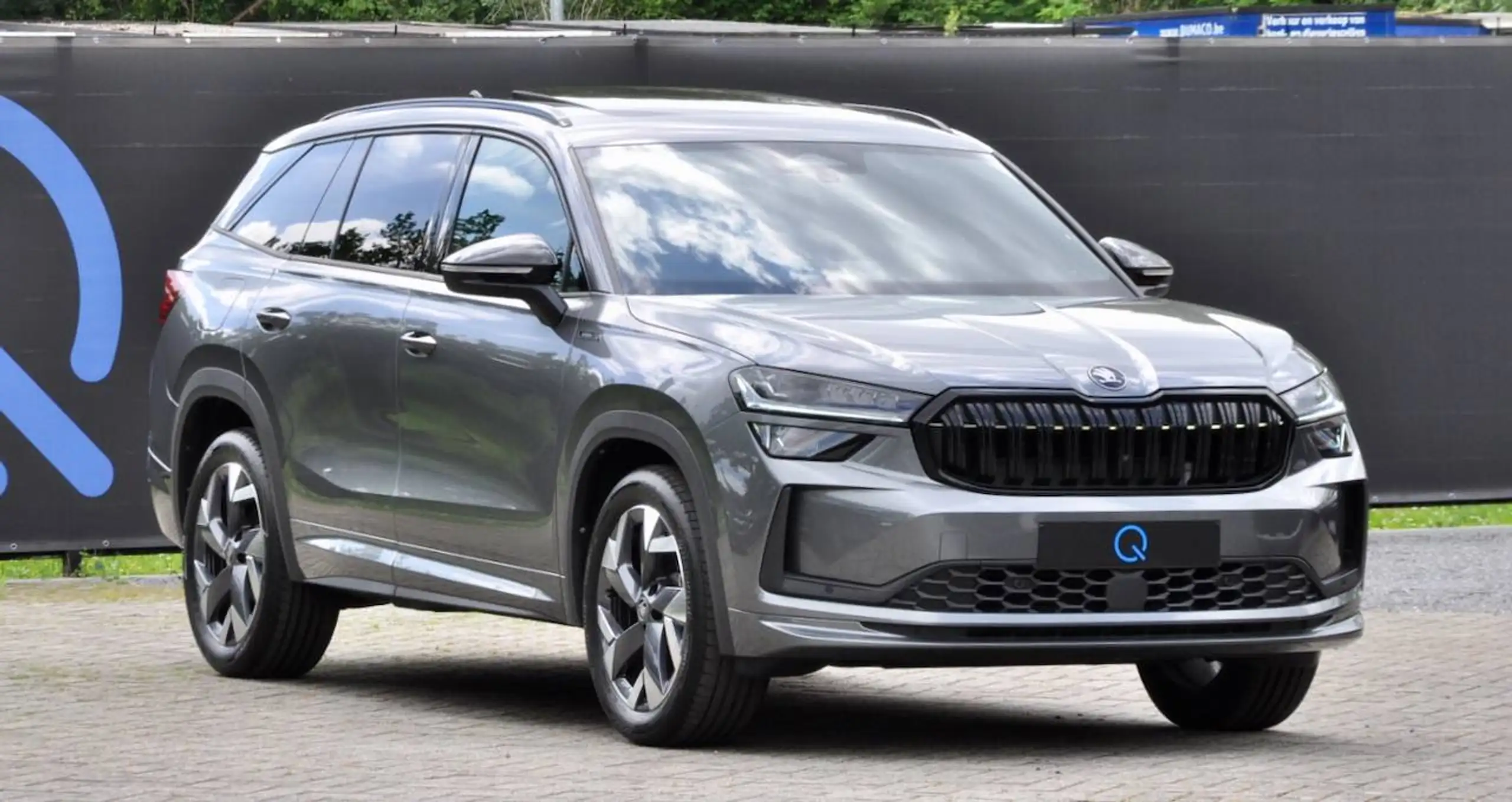 Skoda Kodiaq MHEV SPORTLINE PANO CANTON CAMERA CARPLAY SFEERVERLICHTING MEMORY SEATS — 1/19