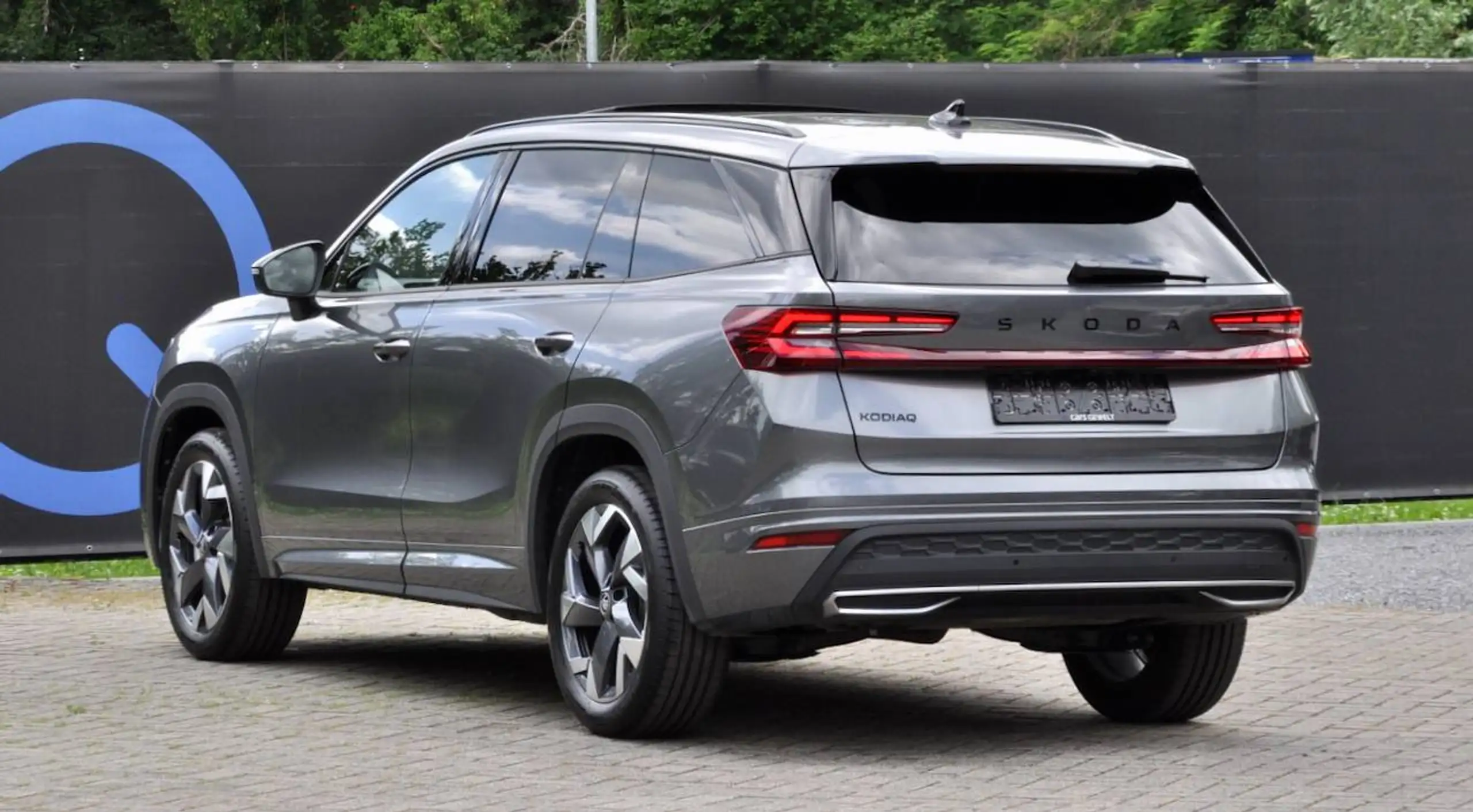 Skoda Kodiaq MHEV SPORTLINE PANO CANTON CAMERA CARPLAY SFEERVERLICHTING MEMORY SEATS — 3/19
