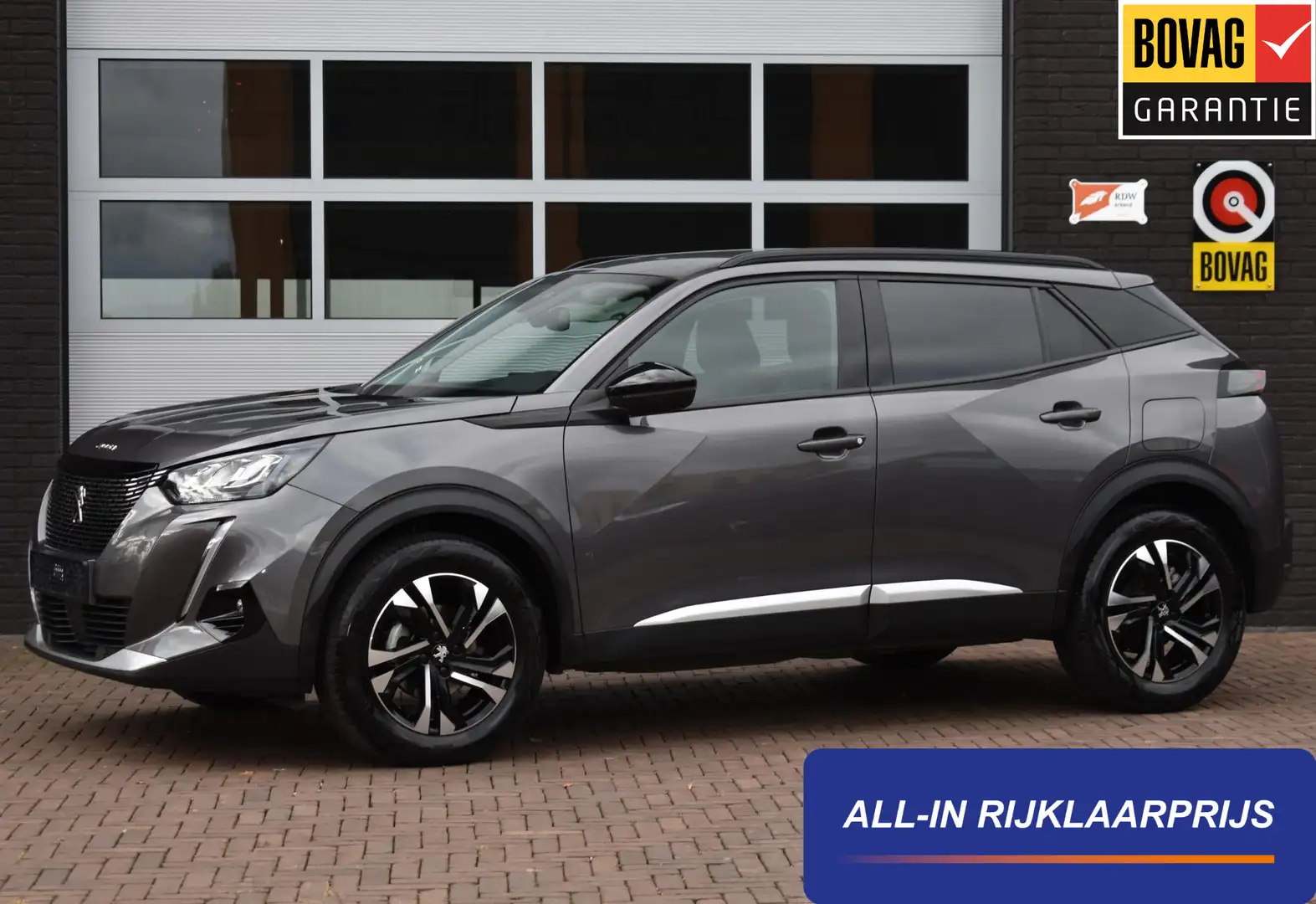 Peugeot 2008 1.2 PureTech 130PK Allure Pack | Trekhaak | Carpla Grijs - 1