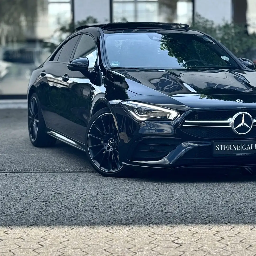 Mercedes-Benz CLA 35 AMG 4MATIC/PANO/RÜCKF/MEMORY/BURM LED Bi Zwart - 1