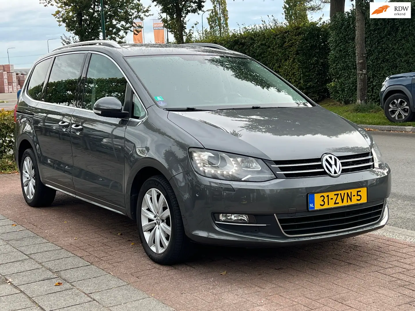 Volkswagen Sharan 2.0 TSI Highline 7Pers.| AUTOMAAT Grigio - 1