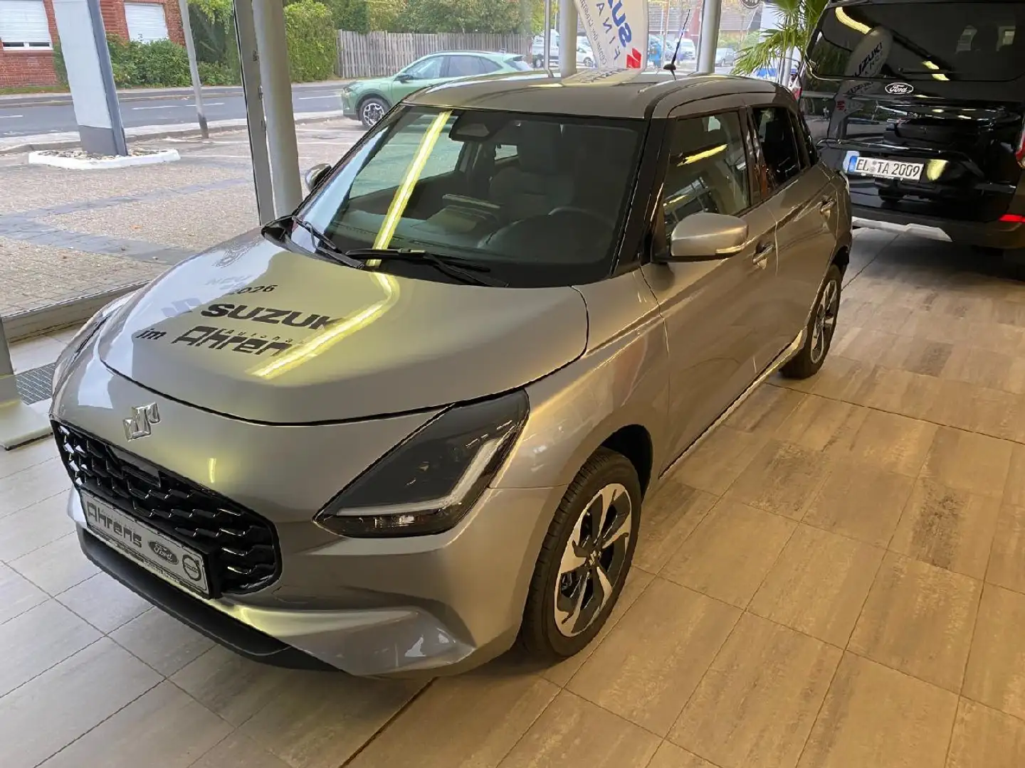 Suzuki Swift 1.2 Dualjet Hybrid 61 kW Comfort+ Grau - 1