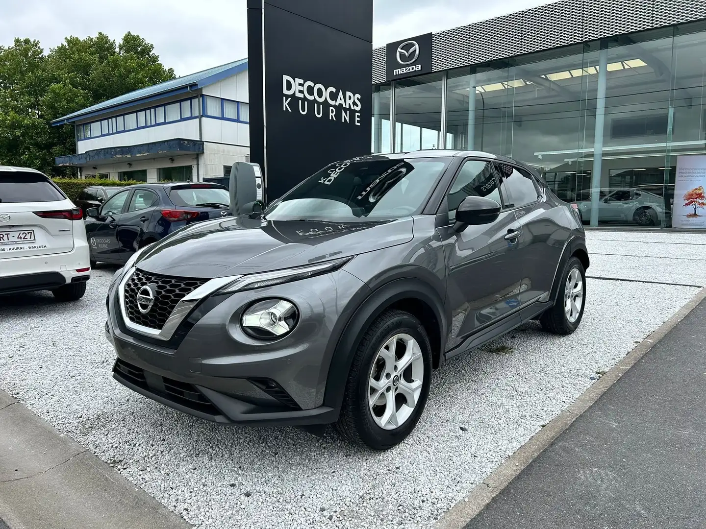 Nissan Juke Juke 1.0 DIG-T/ Carplay/ Navi/ Camera/ AutoAirco Grijs - 1