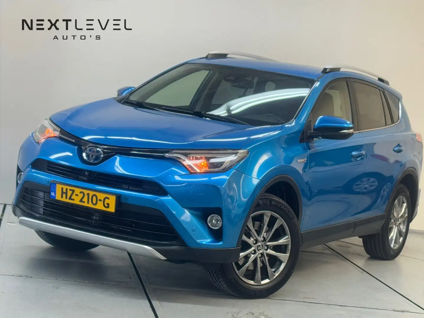 Toyota RAV 4 2.5 Hybrid AWD Executive Business Trekhaak 360 Vol Blue - 1