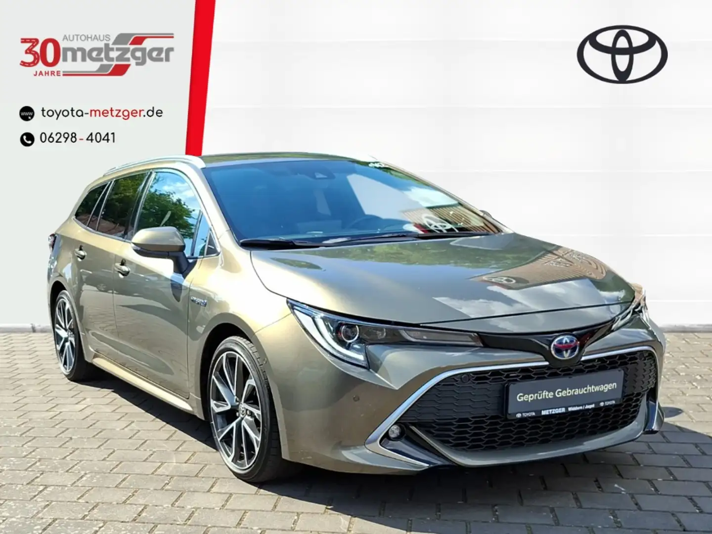 Toyota Corolla Touring Sports 2.0 Hybrid Lounge +LED +Navi +Kamer Bronze - 1