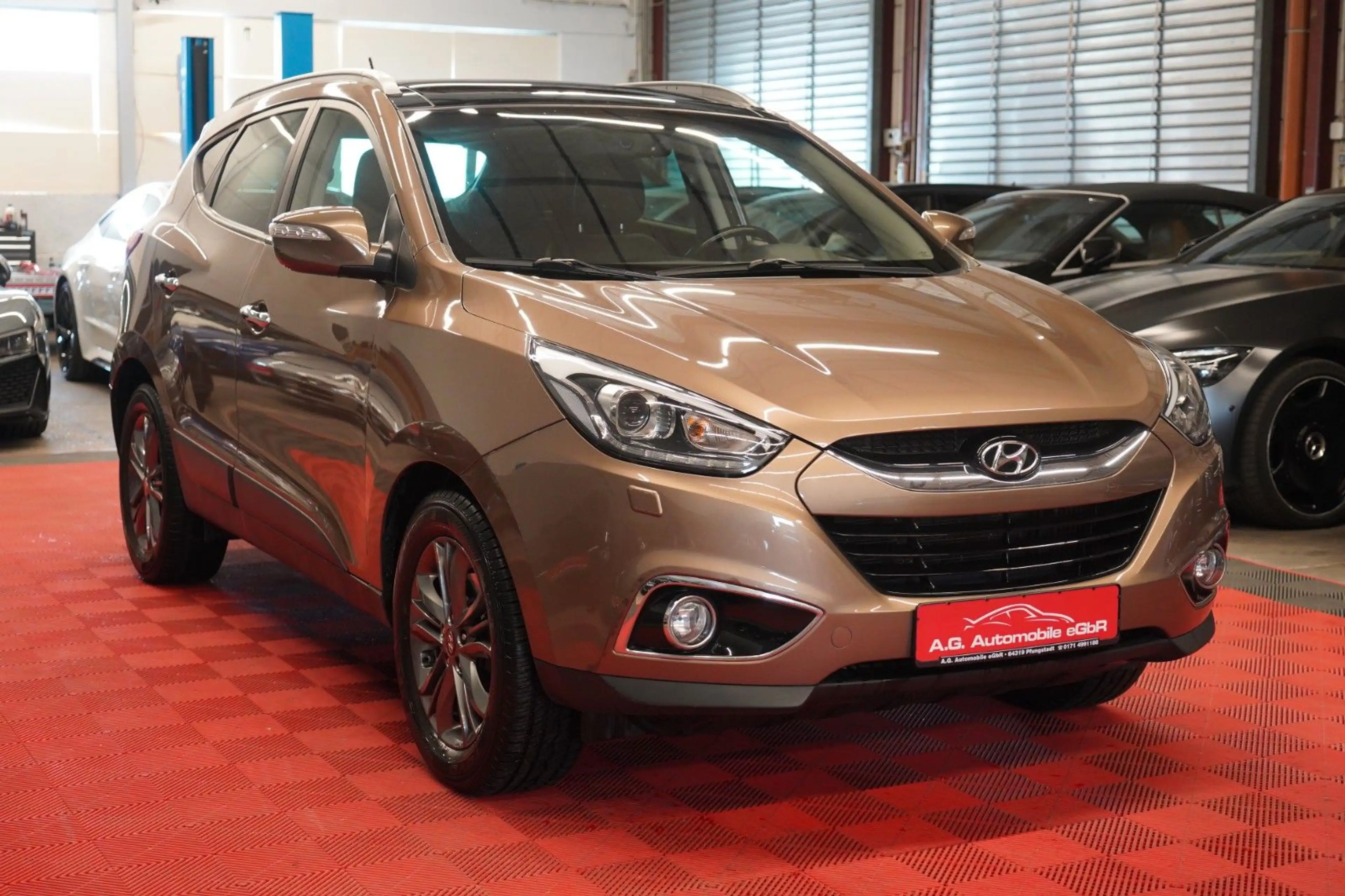 Hyundai iX35 2.0 CRDI AWD Aut. *1.Hand*Unfallfrei*Pano* — photo 3