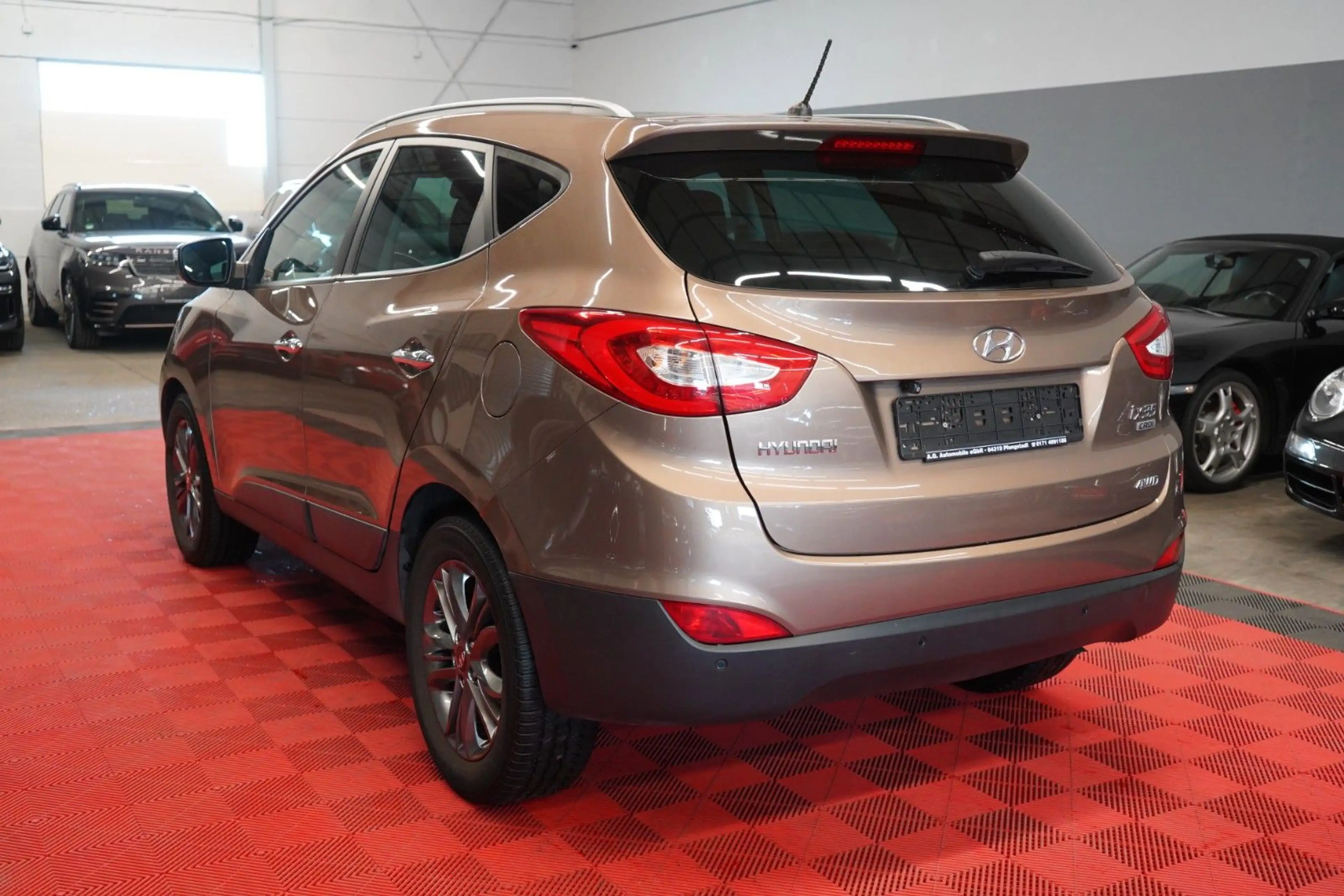 Hyundai iX35 2.0 CRDI AWD Aut. *1.Hand*Unfallfrei*Pano* — photo 9