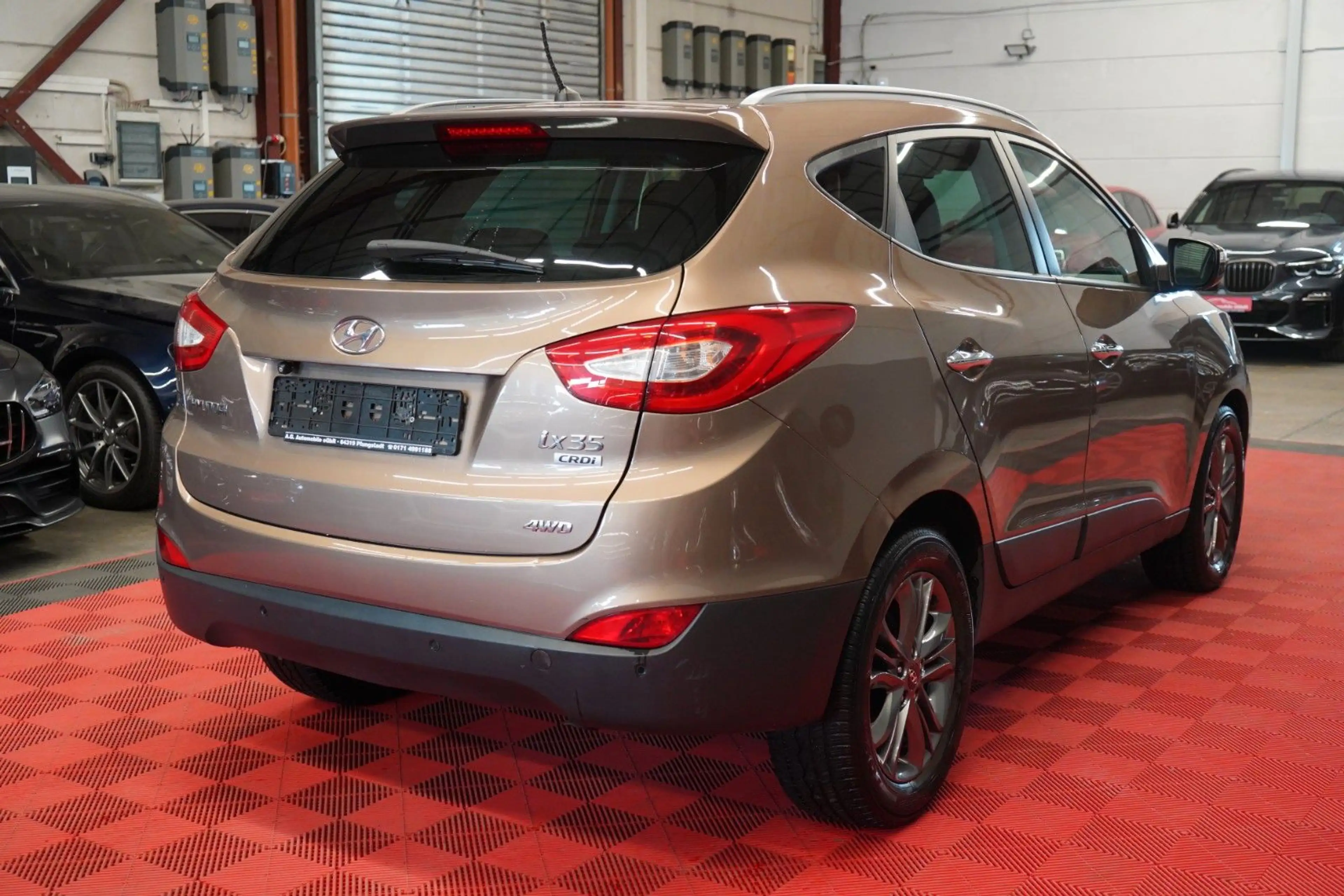 Hyundai iX35 2.0 CRDI AWD Aut. *1.Hand*Unfallfrei*Pano* — photo 7