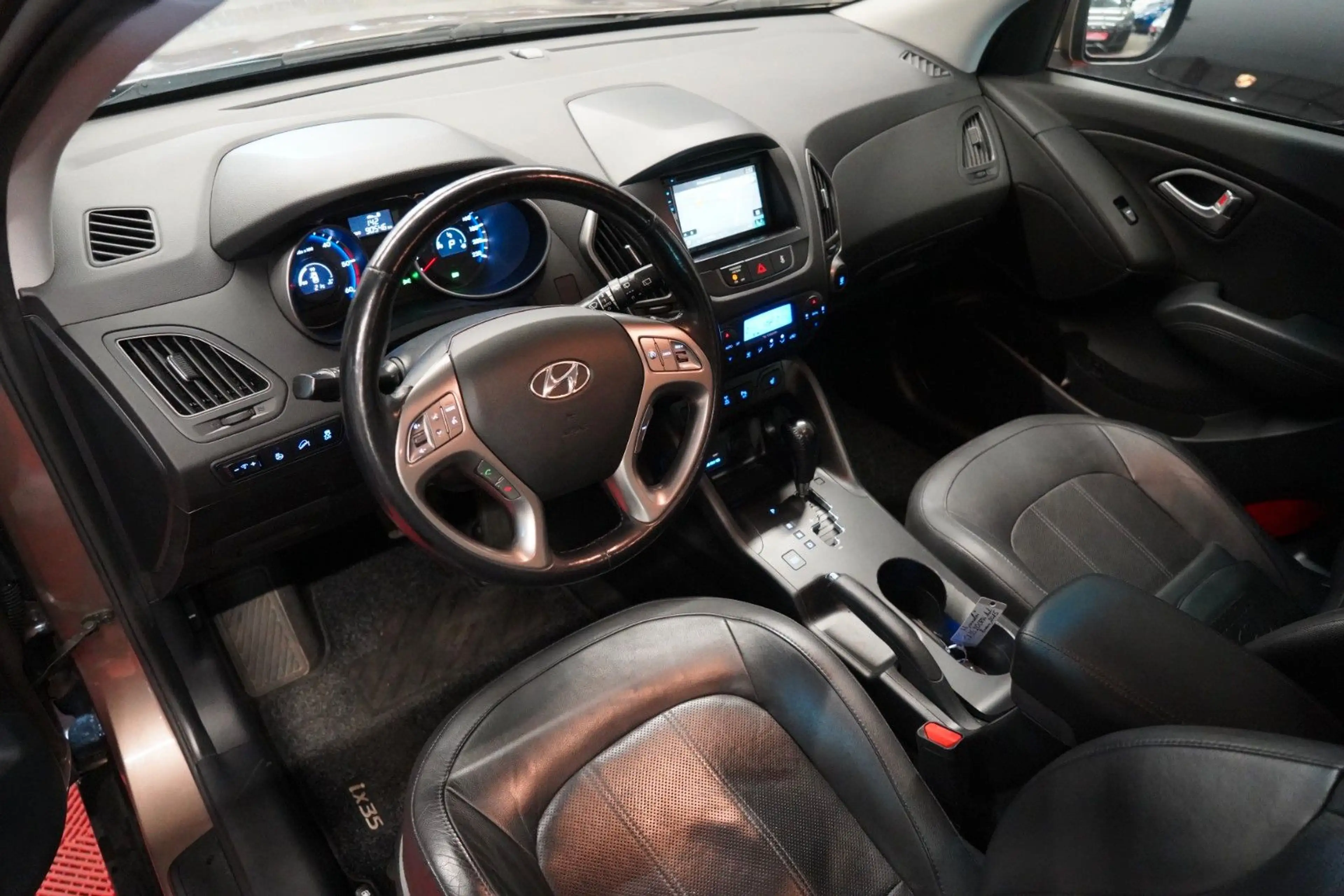 Hyundai iX35 2.0 CRDI AWD Aut. *1.Hand*Unfallfrei*Pano* — photo 13