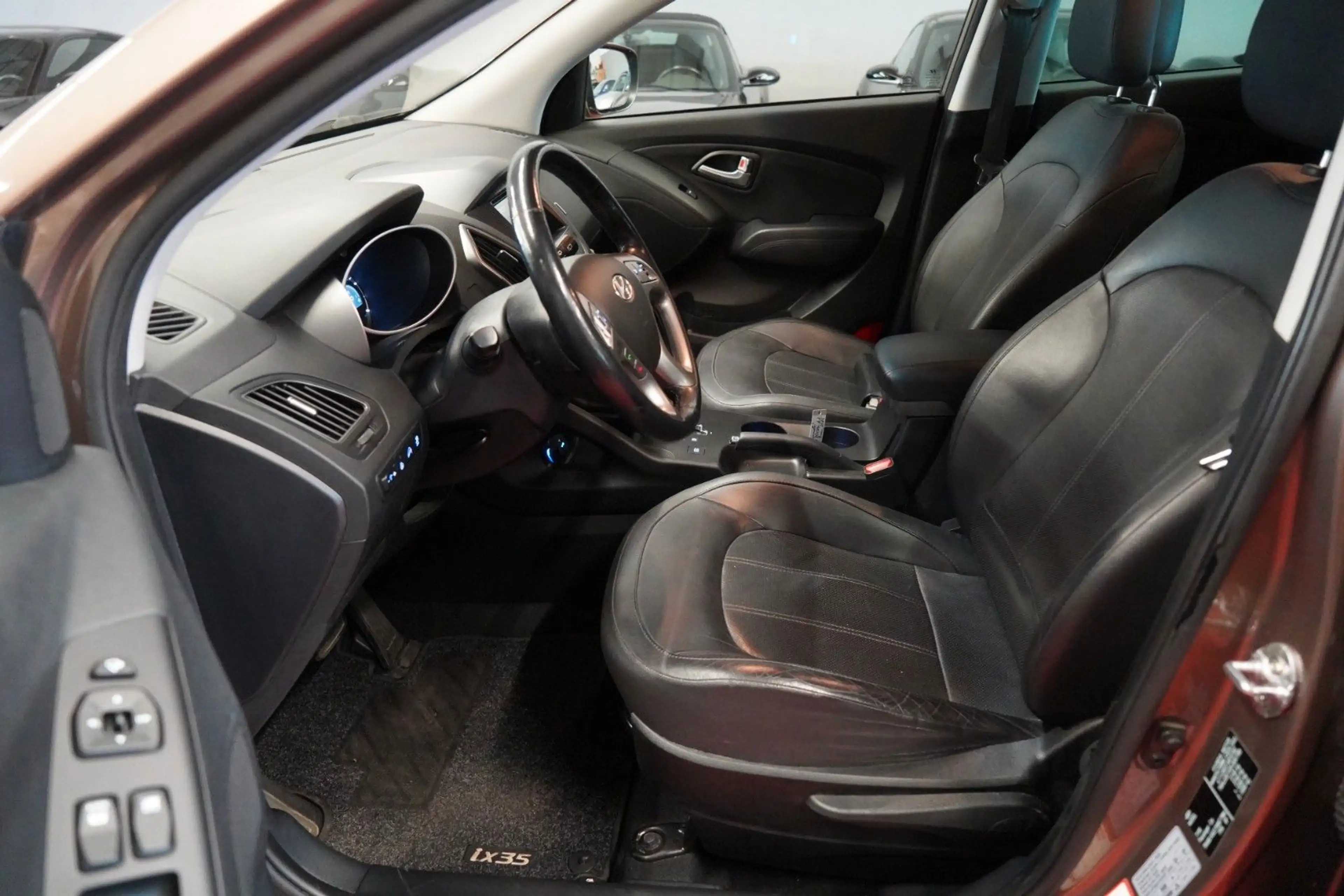 Hyundai iX35 2.0 CRDI AWD Aut. *1.Hand*Unfallfrei*Pano* — photo 14