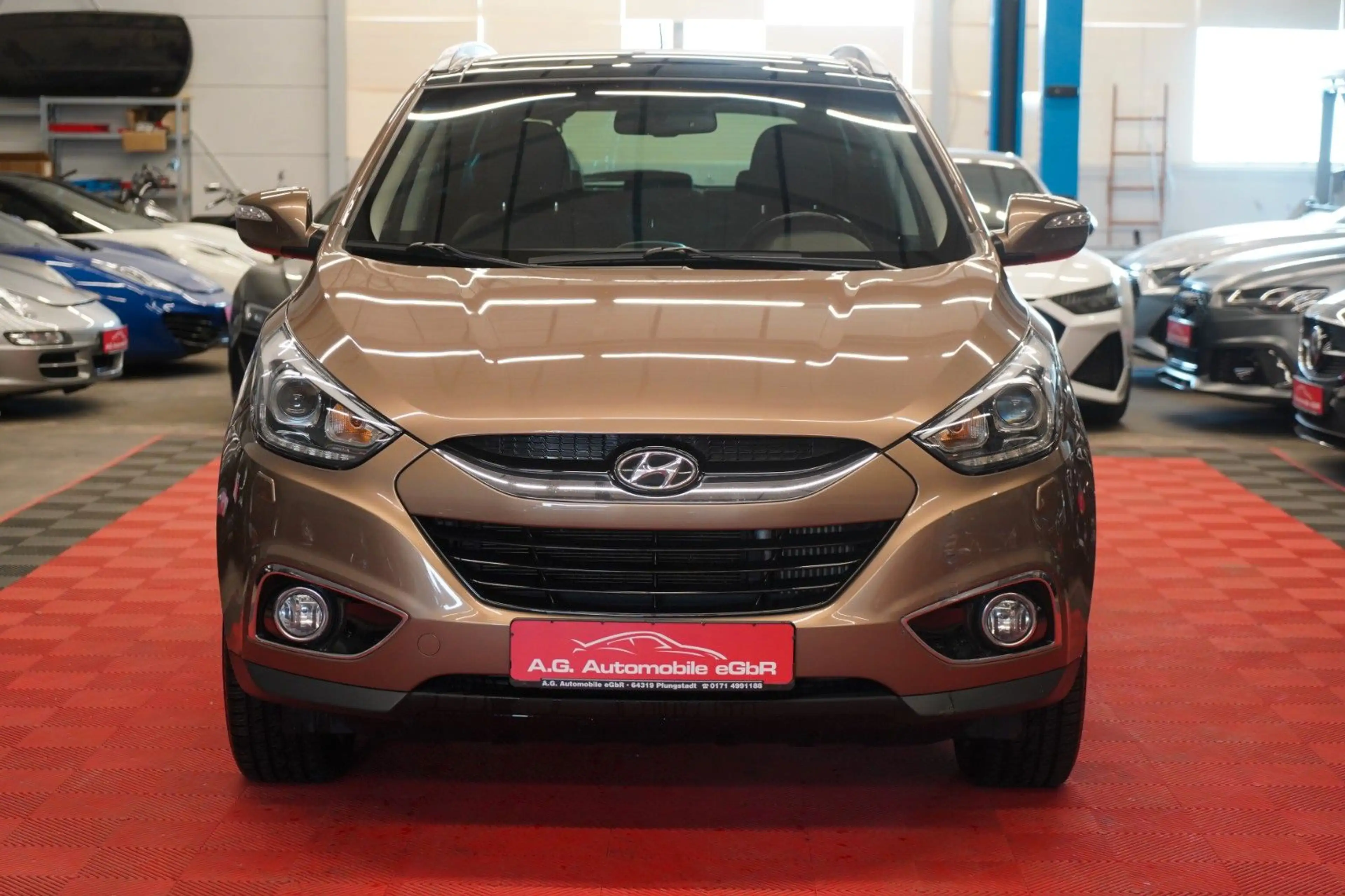 Hyundai iX35 2.0 CRDI AWD Aut. *1.Hand*Unfallfrei*Pano* — photo 2