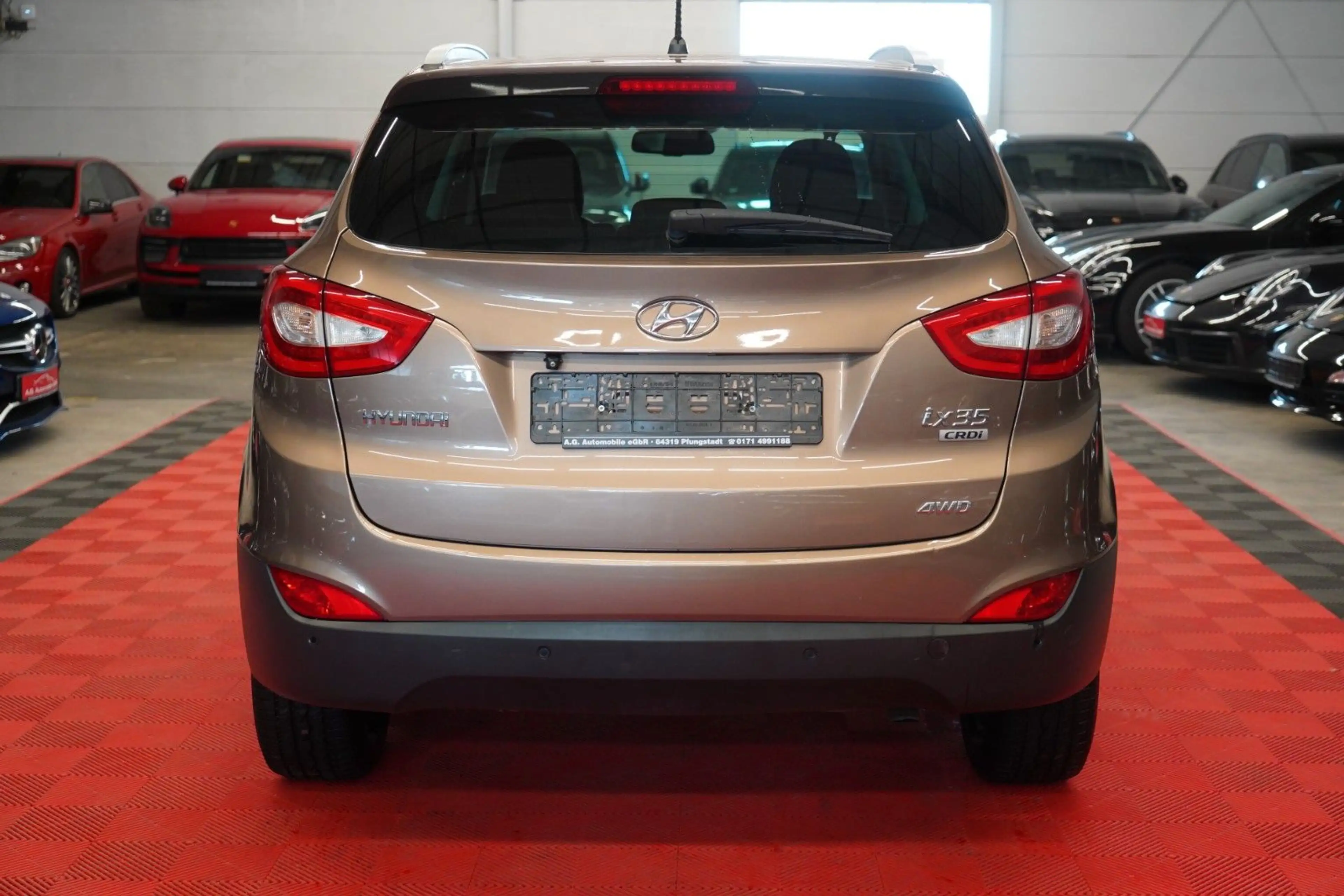 Hyundai iX35 2.0 CRDI AWD Aut. *1.Hand*Unfallfrei*Pano* — photo 8