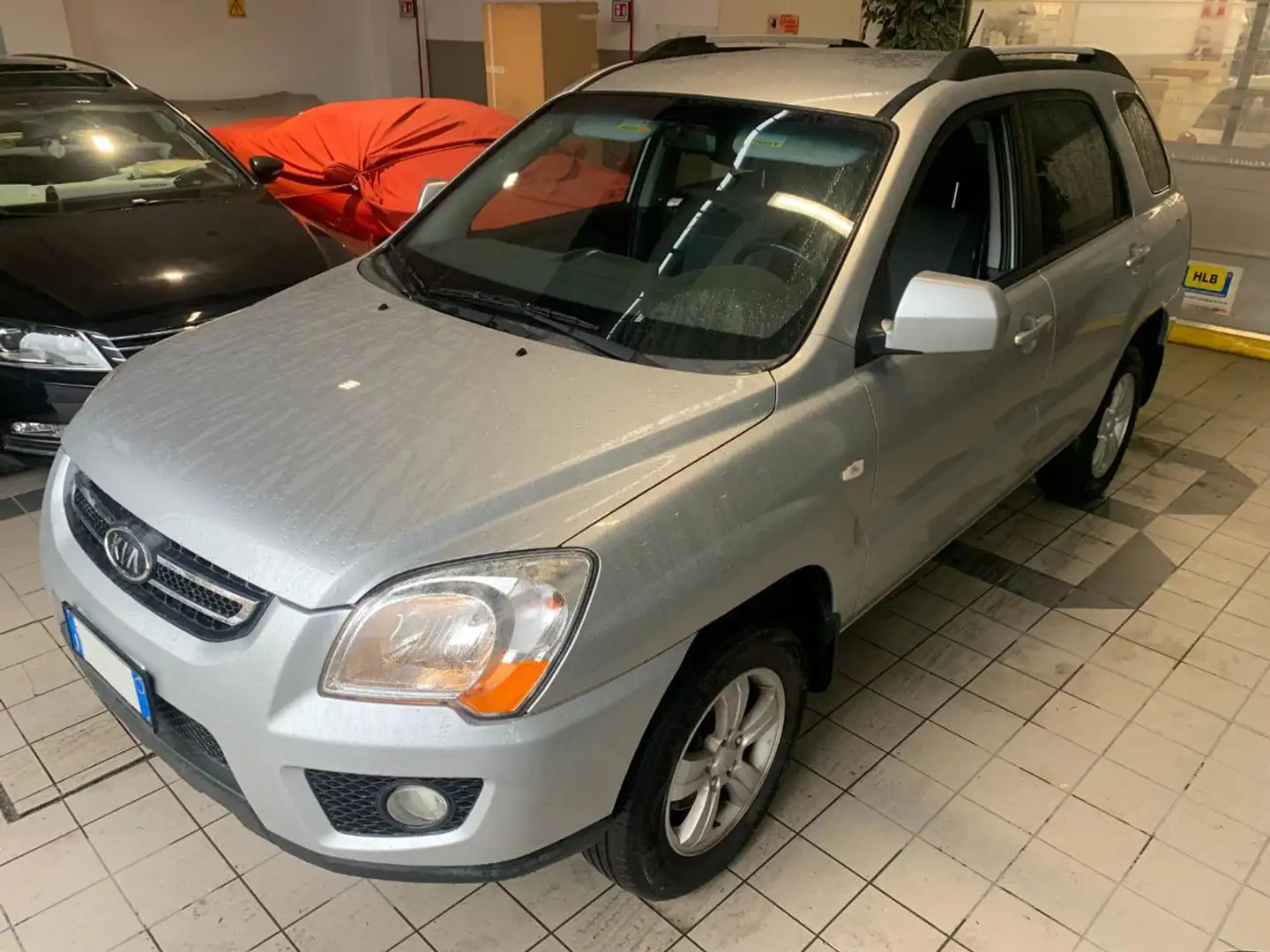 Kia Sportage 2.0i 141Cv 2WD Act "LEGGI BENE" Zilver - 1