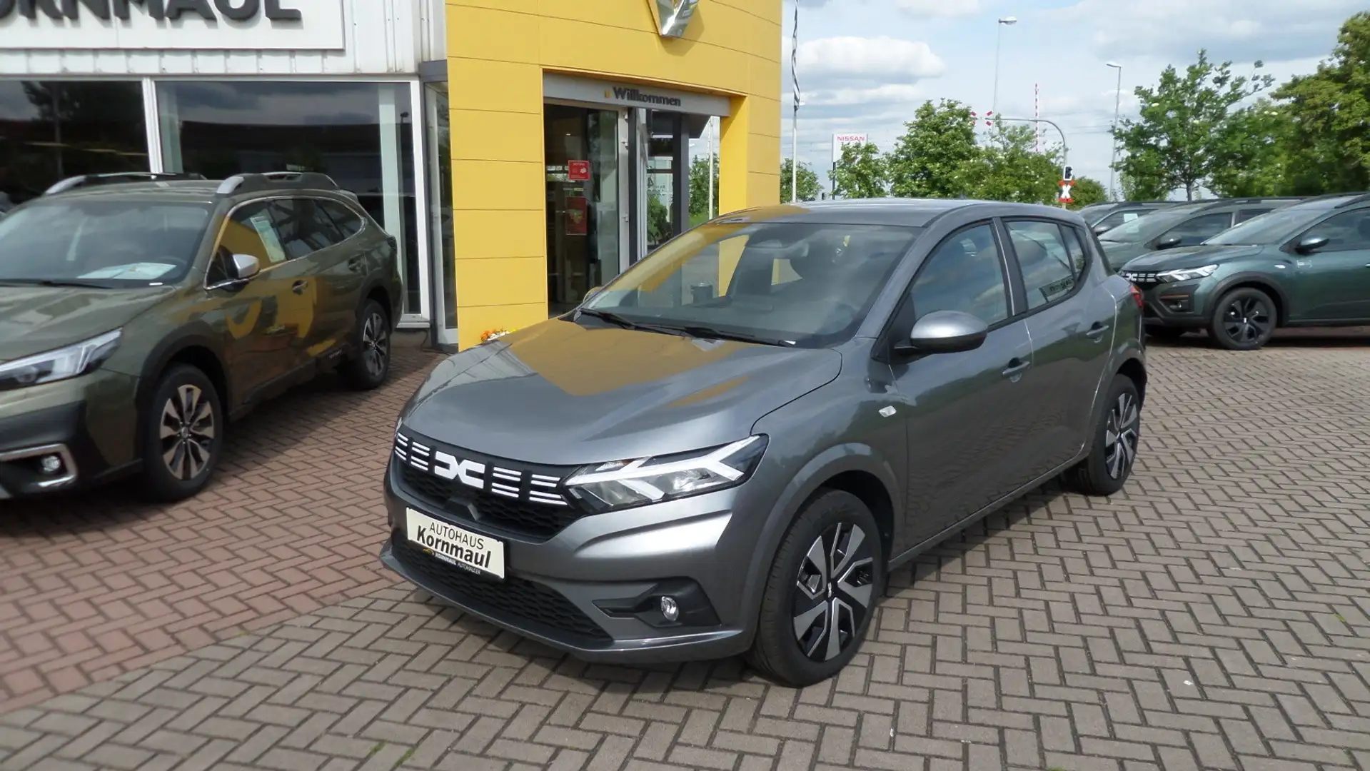 Dacia Sandero III Expression TCe 90 PS mit Navi Tempomat, Multim Grijs - 1