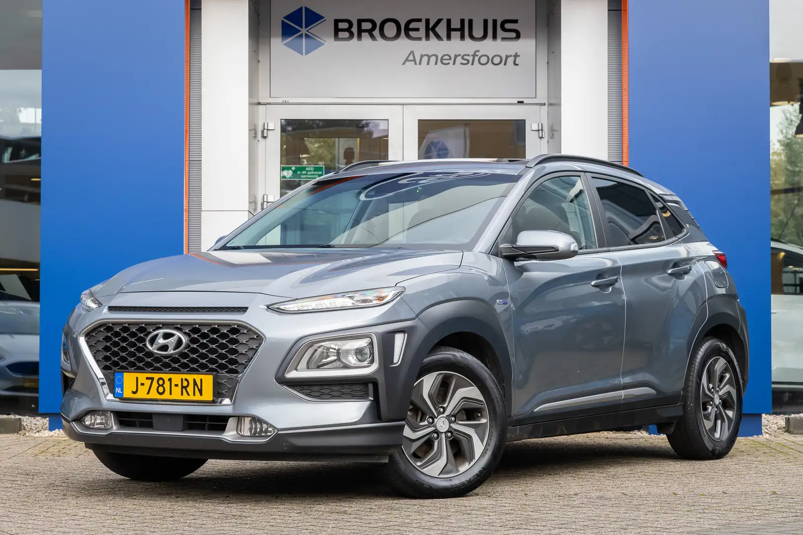 Hyundai KONA 1.6 GDI HEV Fashion Sky | Trekhaak | Schuif-/kante Gris - 1
