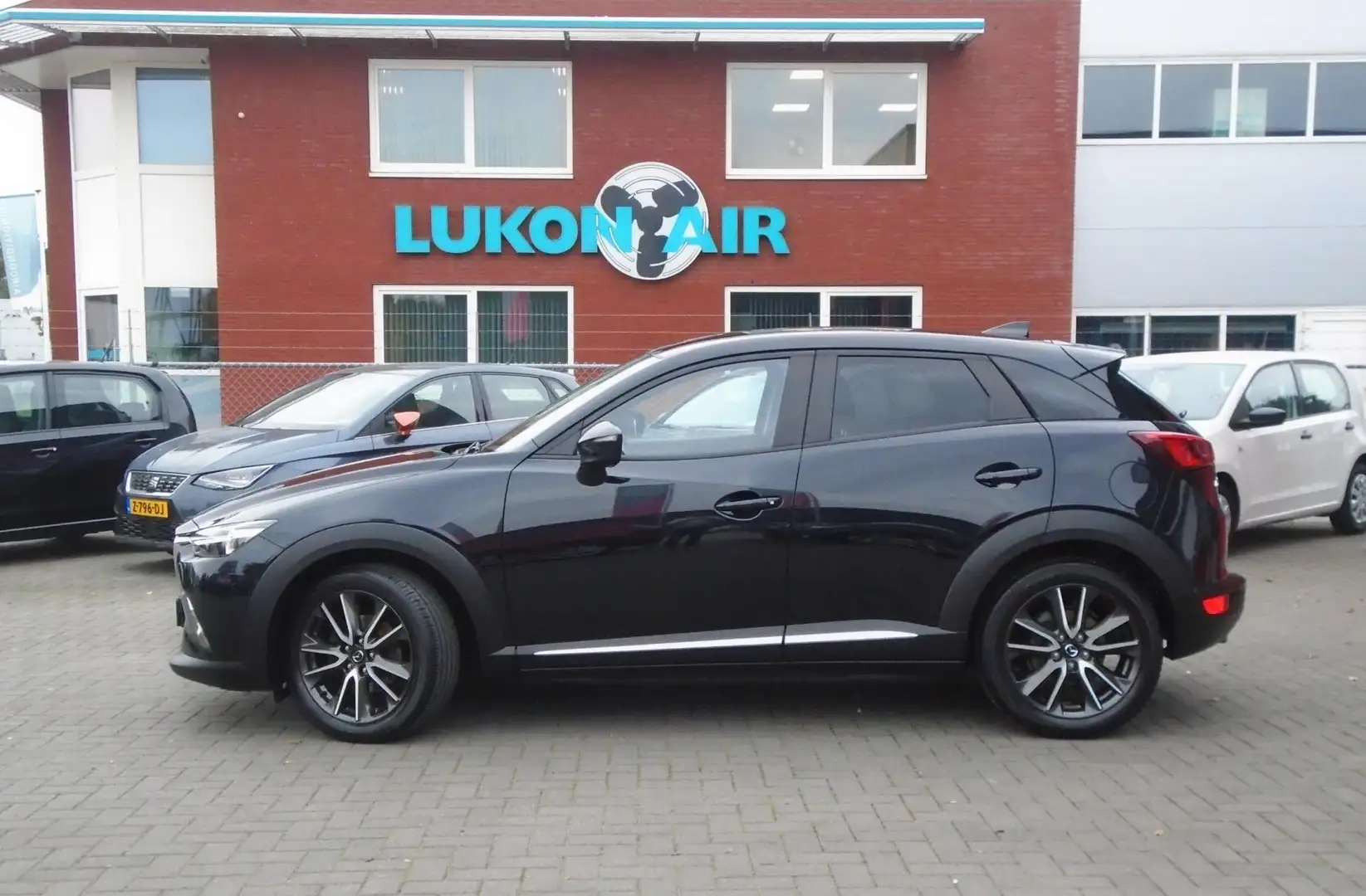 Mazda CX-3 2.0 SkyActiv-G 120 SkyLease+,Cruise,H-Leder,Bose Zwart - 2