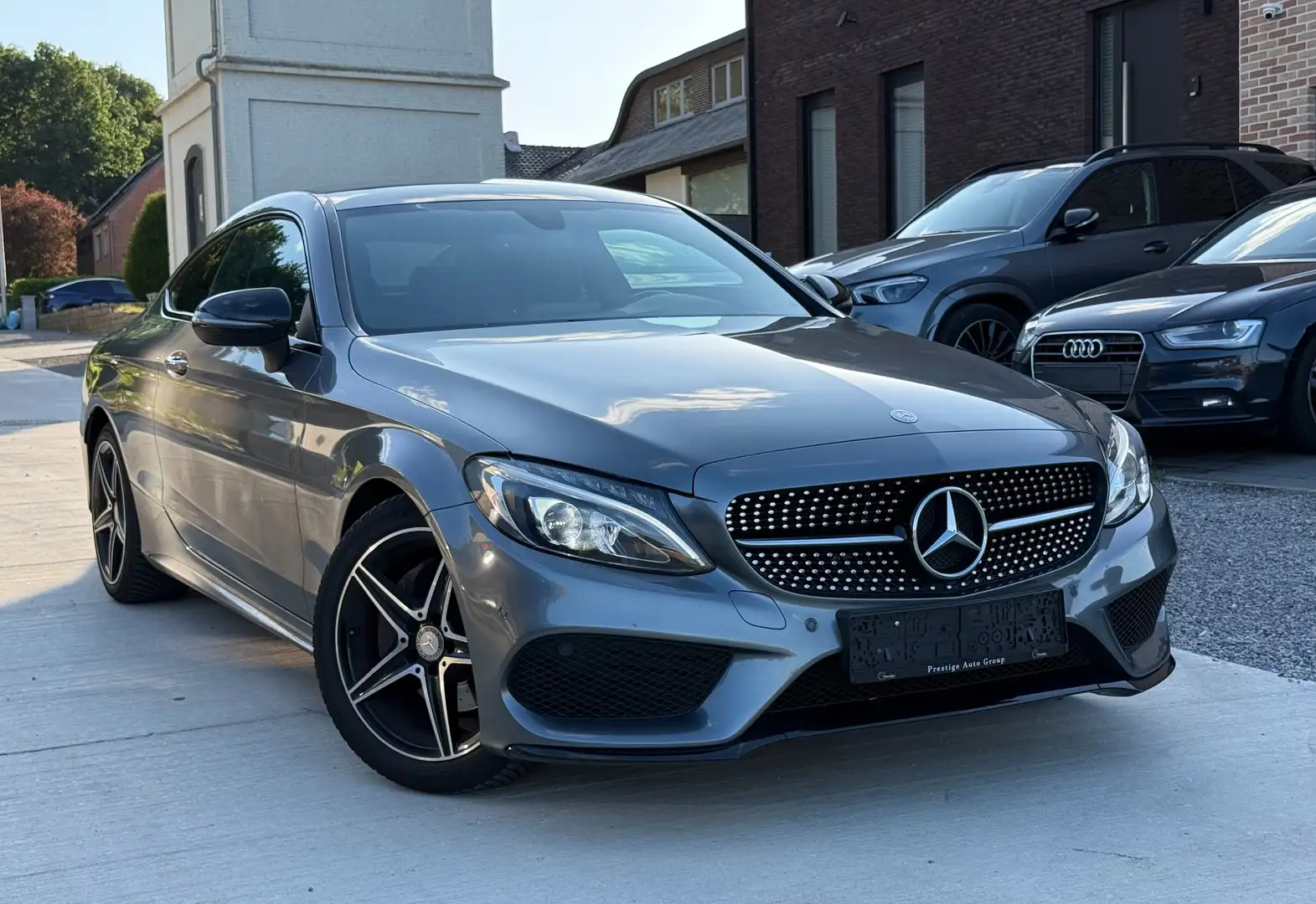 Mercedes-Benz C 180 Coupe AMG-Line *156PK*NAV**Leder**Alcantara* Grijs - 1