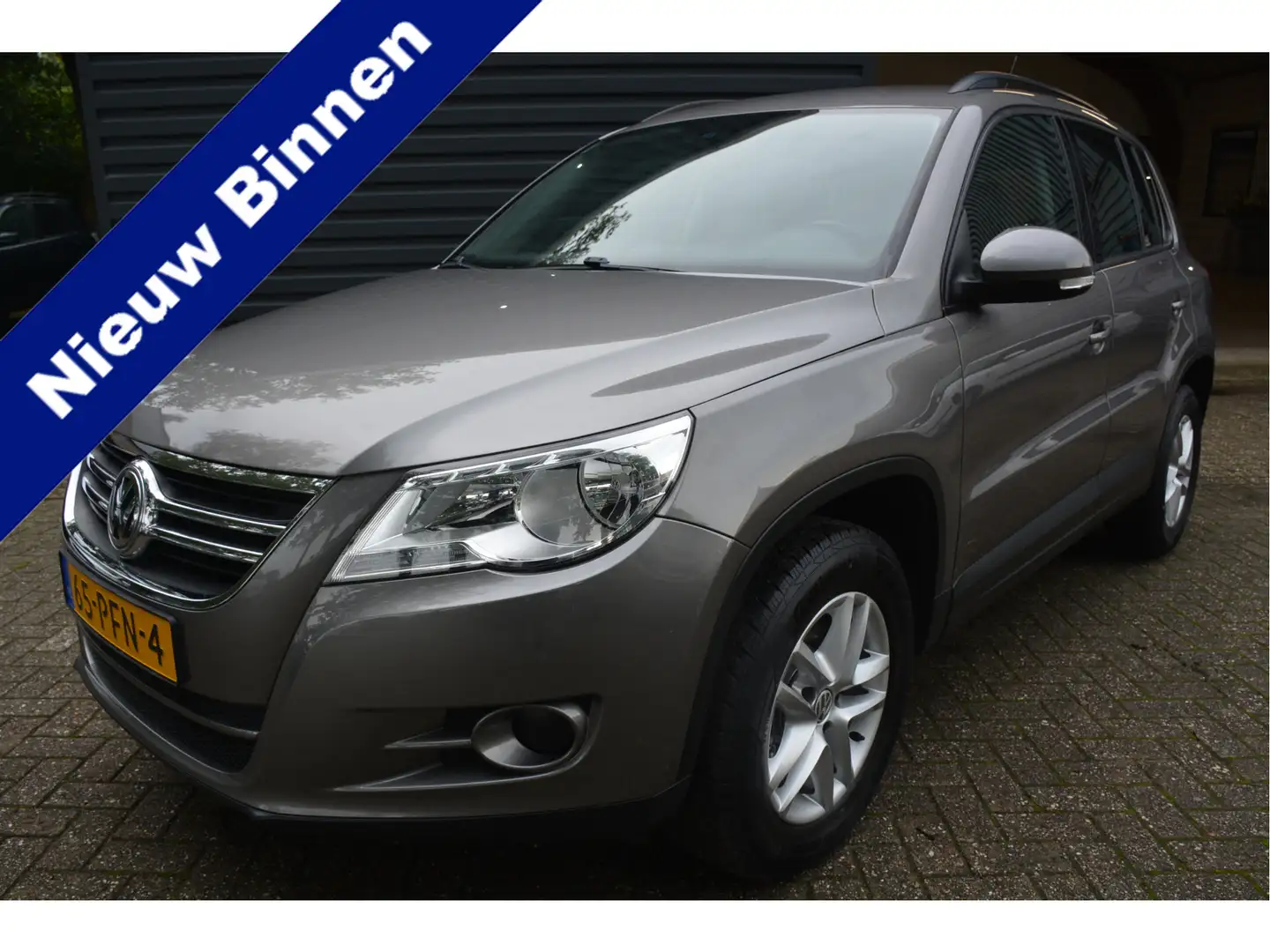 Volkswagen Tiguan 1.4 TSI Comfort&Design Navi Clima Cruise Control T Grijs - 1