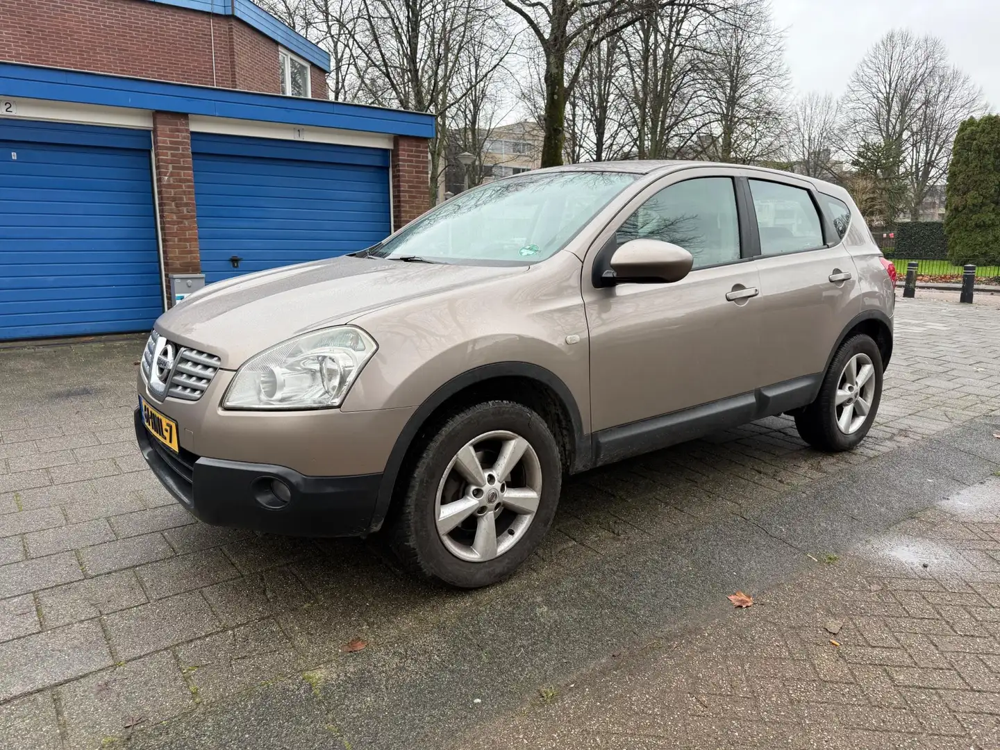 Nissan Qashqai 1.6 Acenta Airco Cruise Trekhaak NW APK Bruin - 1