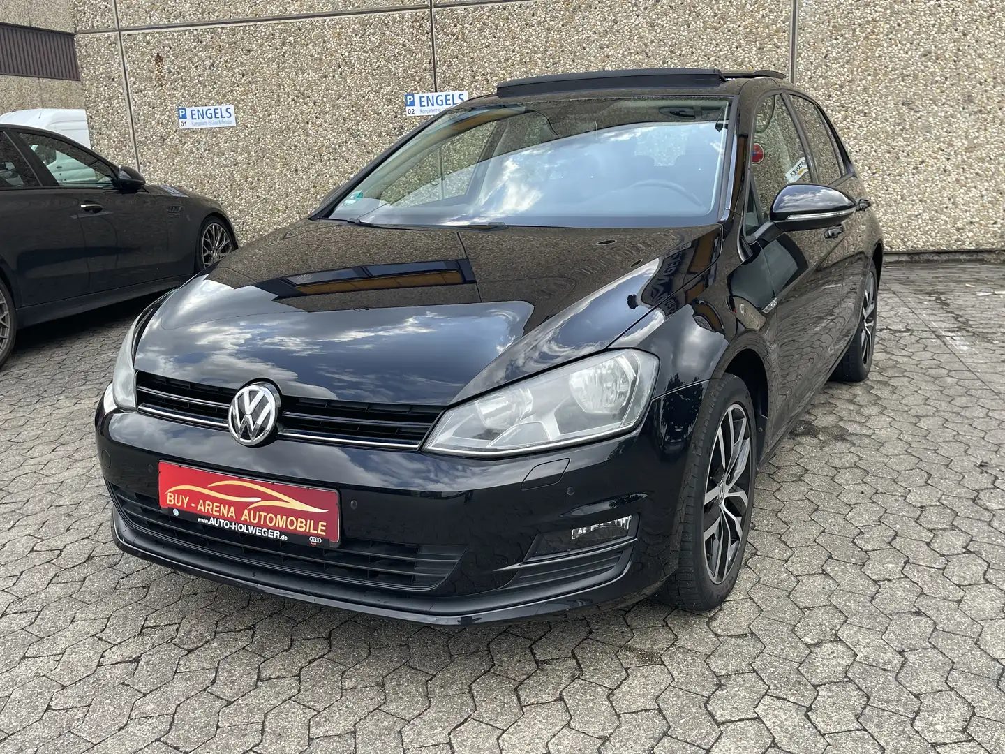 Volkswagen Golf 1.4 TSI Cup BMT Limousine Panorama Navi 2.H Top Zwart - 1