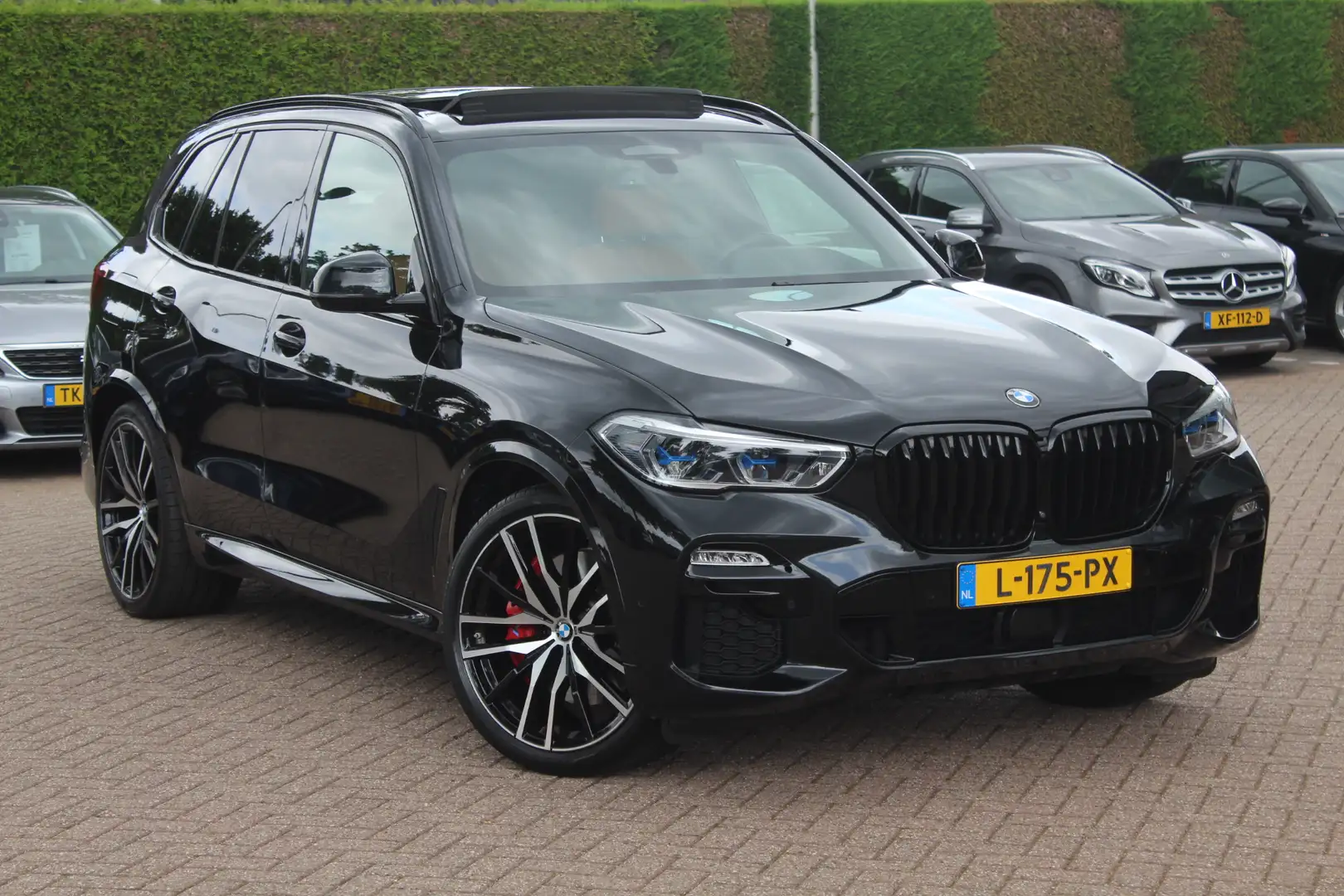BMW X5 xDrive45e High Exe. M Sport / Panoramadak / Camera Zwart - 1