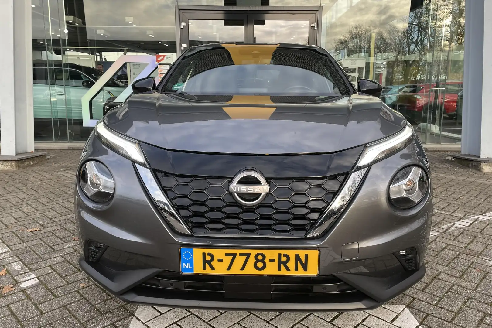 Nissan Juke 1.6 Hybrid N-Connecta | 1e eig. | Nav | Lm velgen Gris - 2