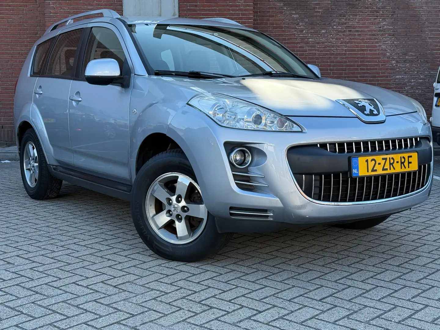Peugeot 4007 2.4 ST 7p.|4x4|NAVI|CAMARA|TREKHAAK Grijs - 1