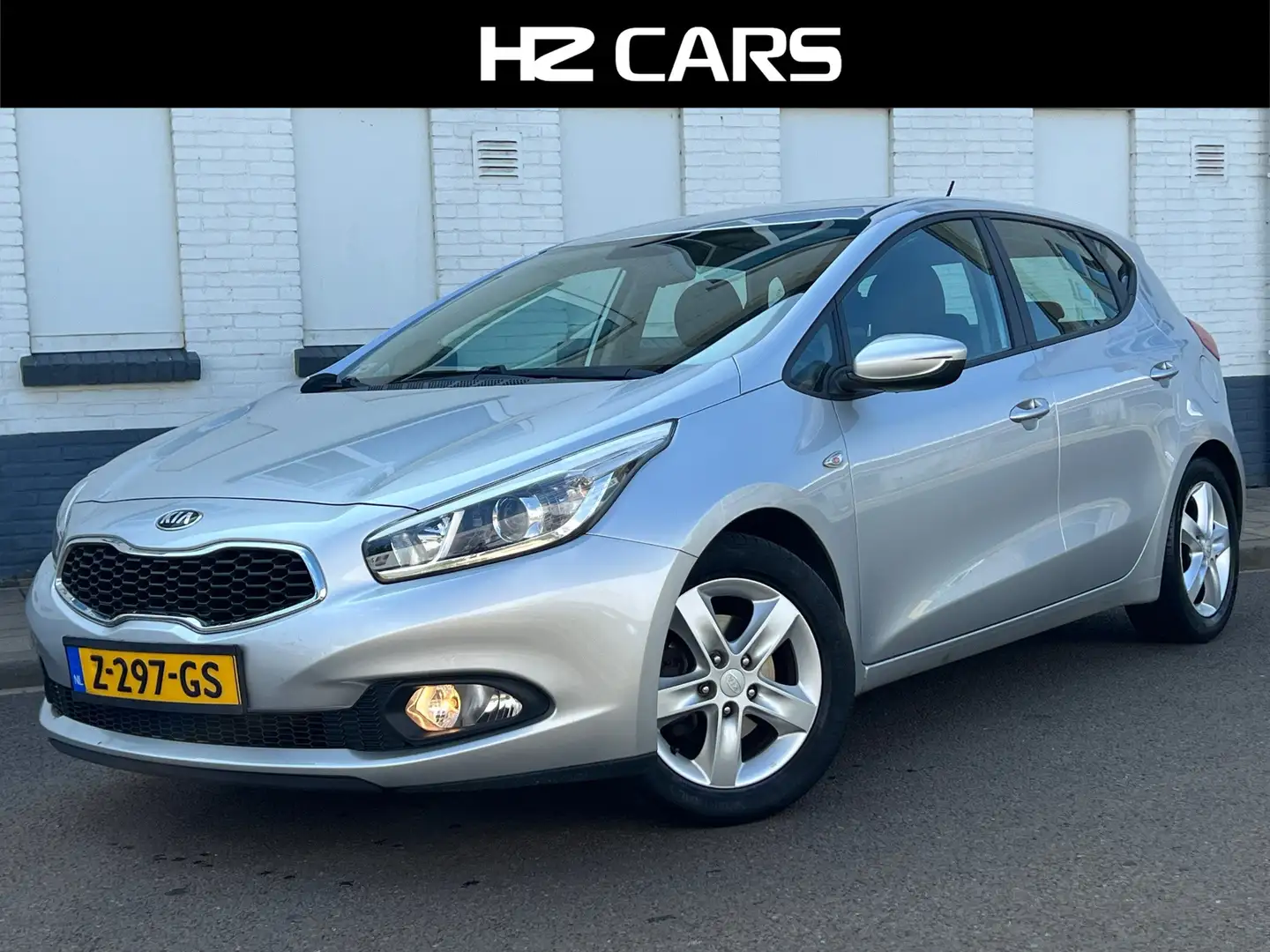 Kia Ceed / cee'd 1.4 CVVT|PDC|Cruise|Airco|Winterpakket|Bluetooth Grau - 1