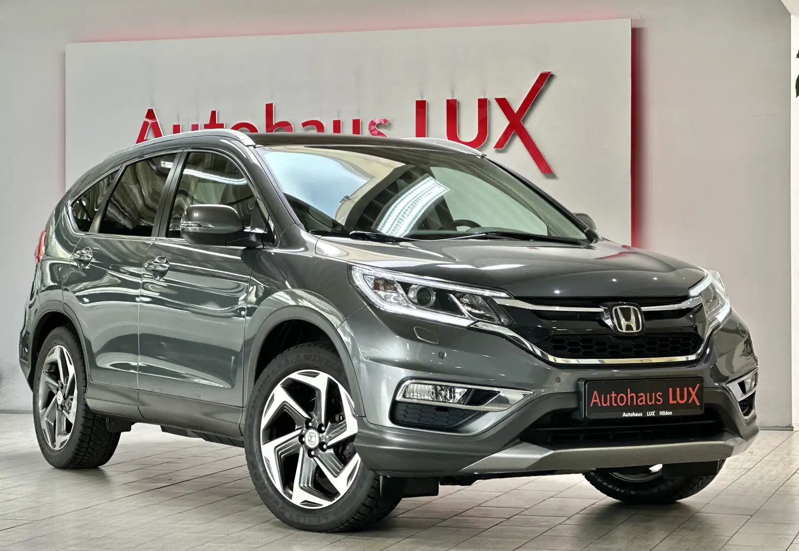 Honda CR-V EXECUTIVE*4WD*AUTOMATIK*ACC*PANO*AHK*BIXENON Grau - 1