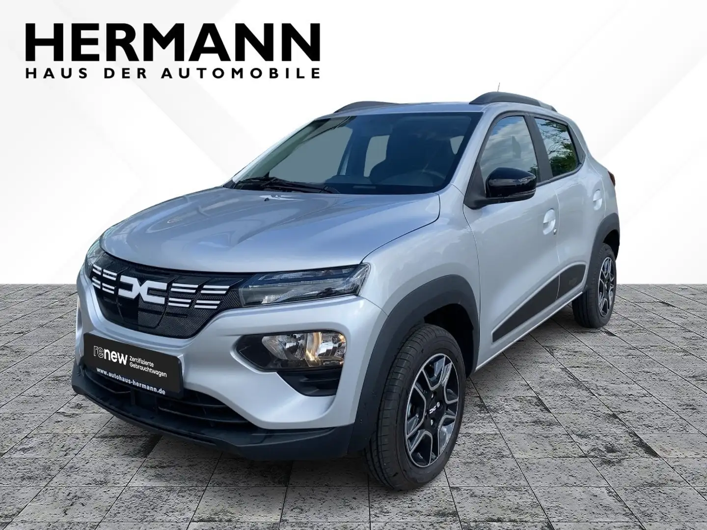 Dacia Spring Electric 45  Essential *NAVI*LED*Leder Grijs - 1