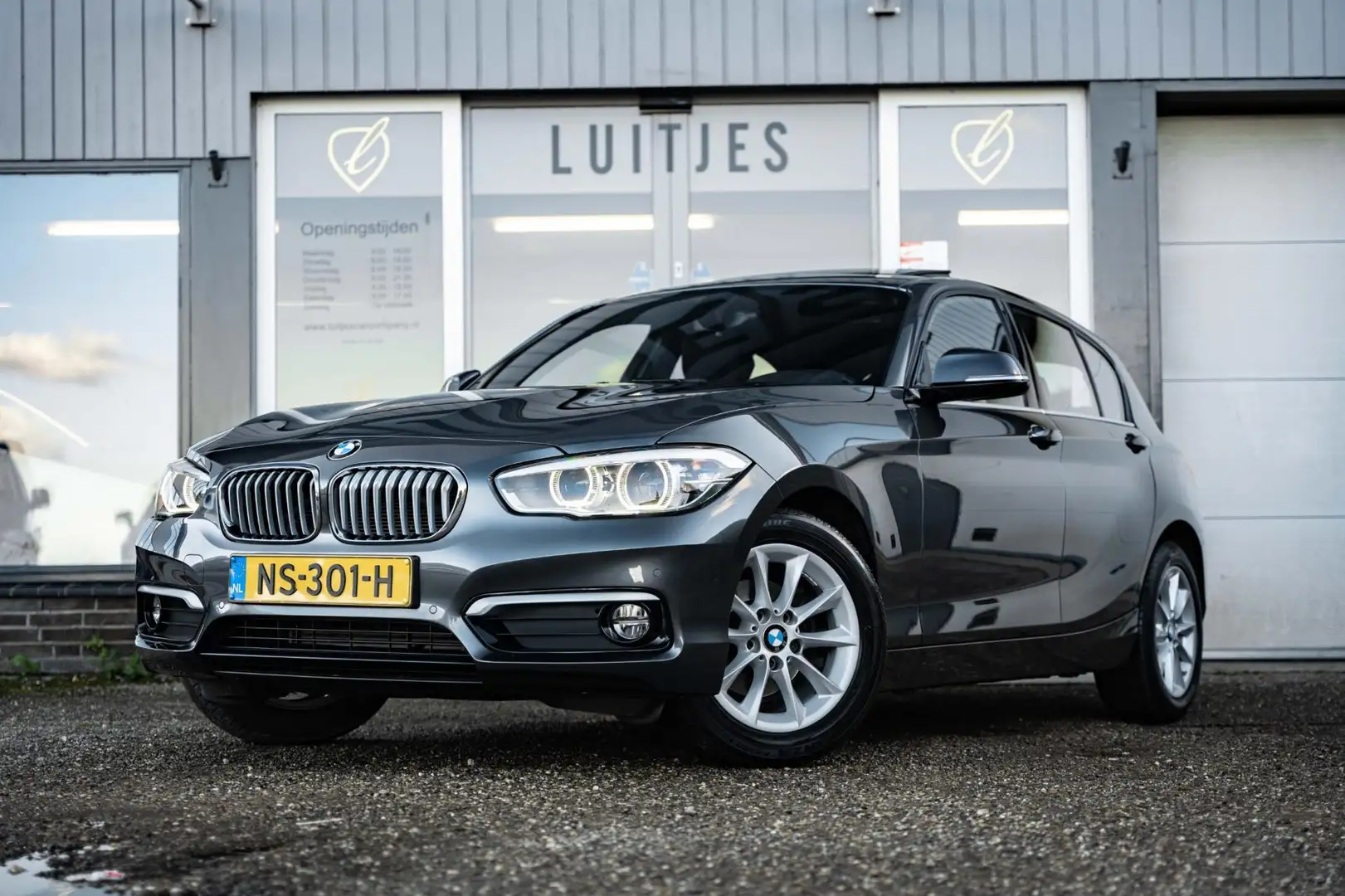 BMW 118 1-serie 118i AUT8 High-Executive Schuifdak NL-auto Gris - 1