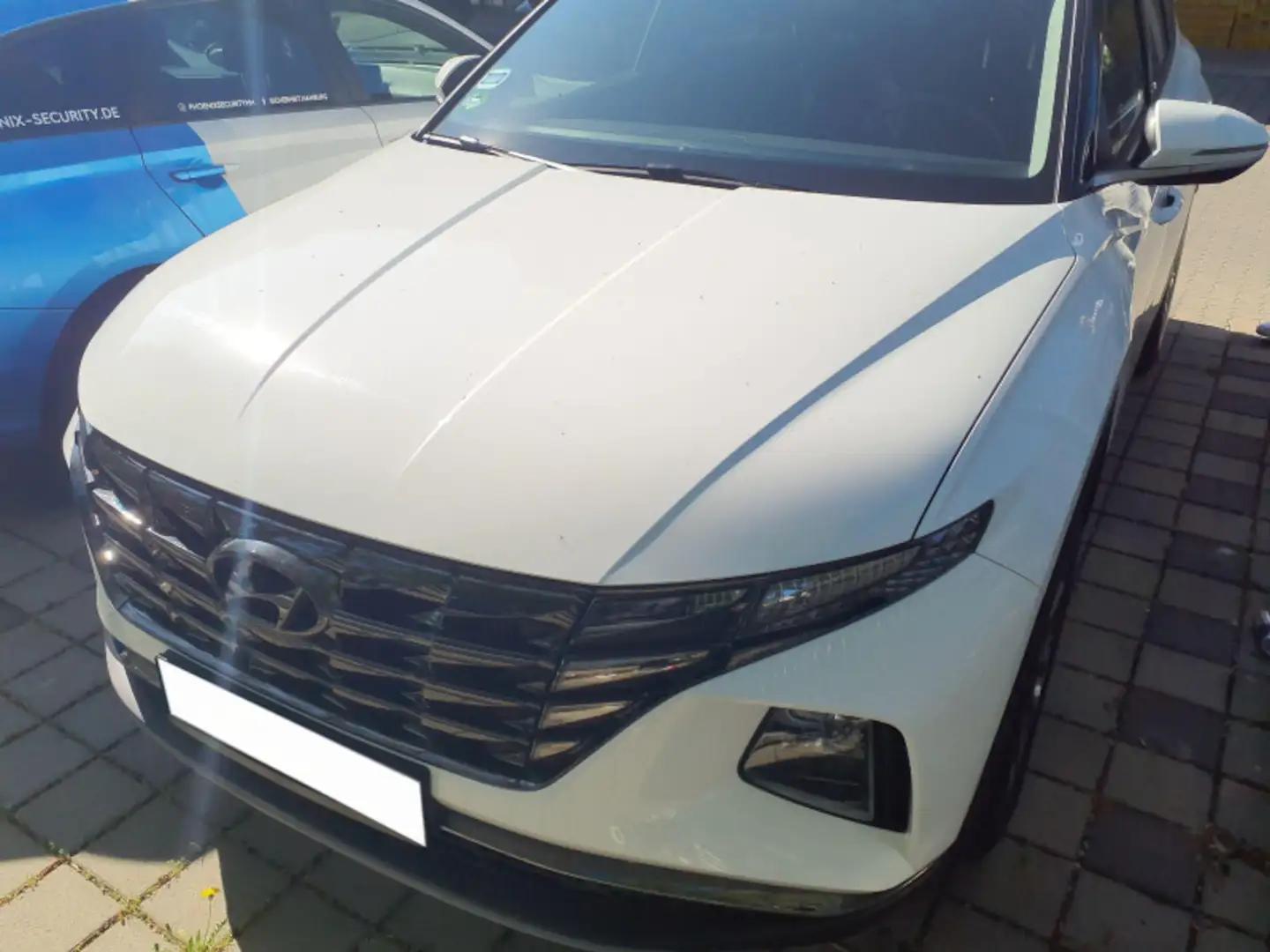 Hyundai TUCSON 1.6 Mild-Hybrid 2WD Automatik Weiß - 1