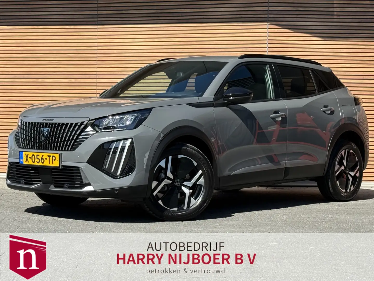 Peugeot 2008 1.2 PureTech 100 Allure Camera / Navigatie / Parke Grigio - 1