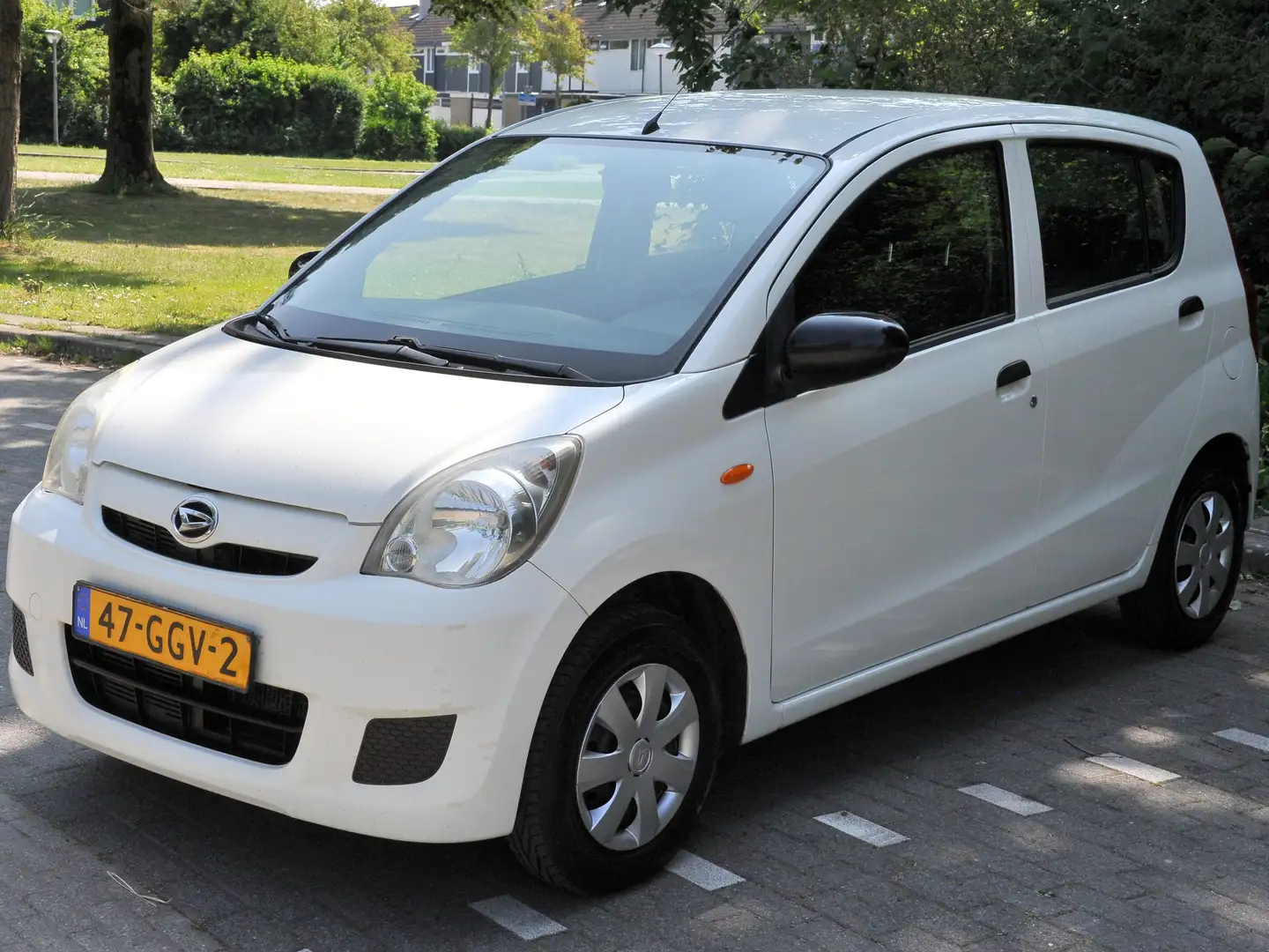 Daihatsu Cuore Cuore 1.0 Trend Білий - 1