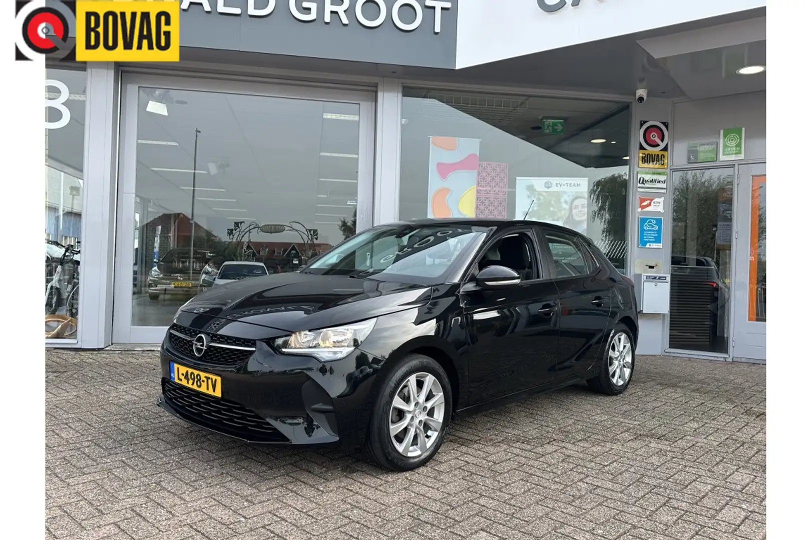 Opel Corsa (Verkocht) 1.2 Edition | Airco | Cruise | Navi | C Zwart - 1