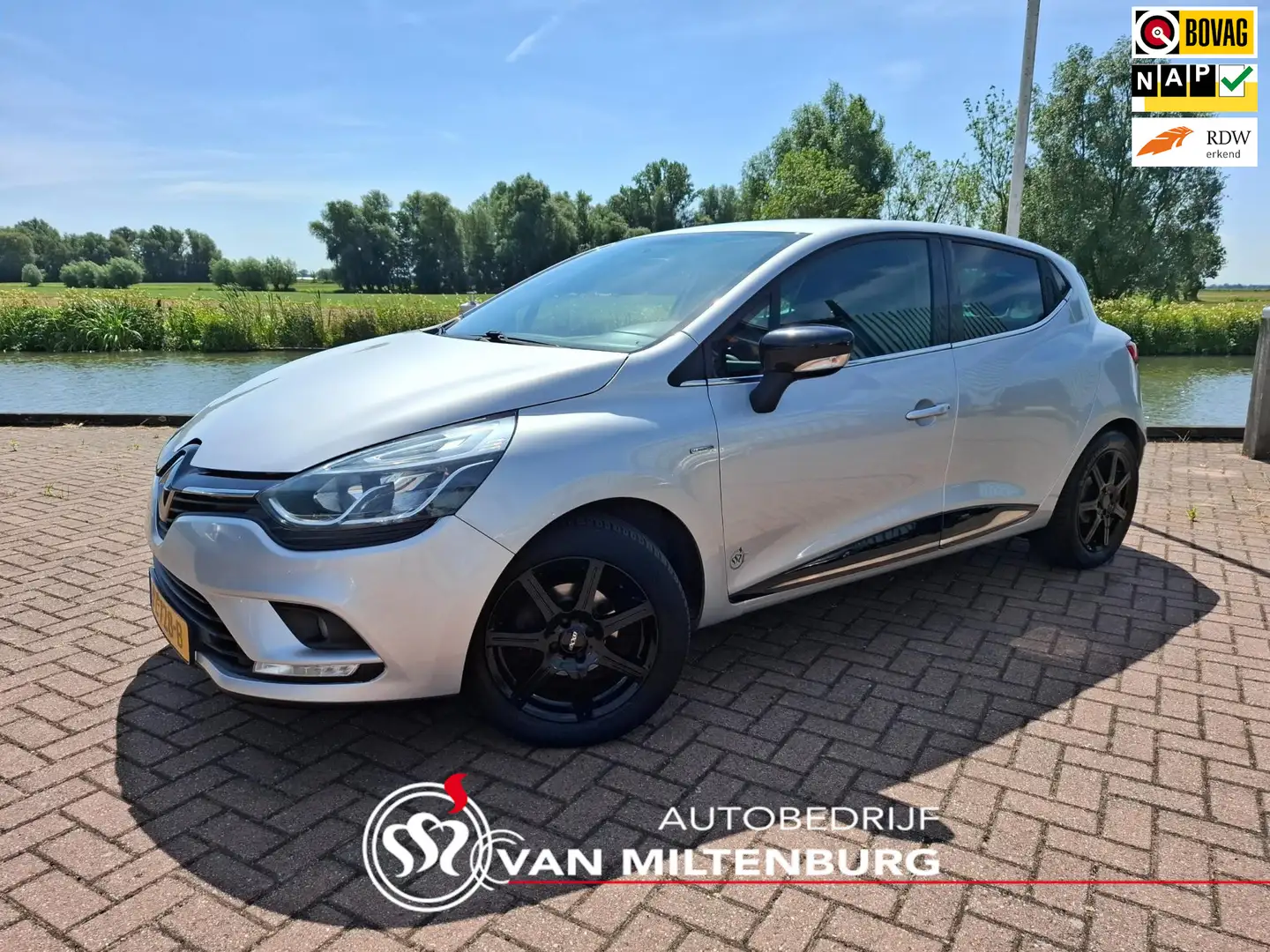 Renault Clio 0.9 TCe Limited Airco Navi Cruise PDC Bluetooth Grijs - 1