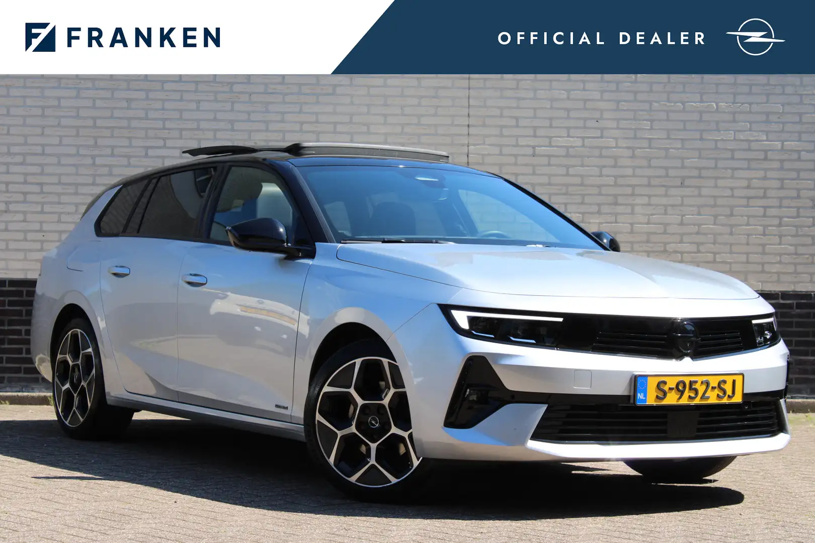 Opel Astra Sports Tourer 1.2 Ultimate Level 4 | Panoramadak | Grijs - 1