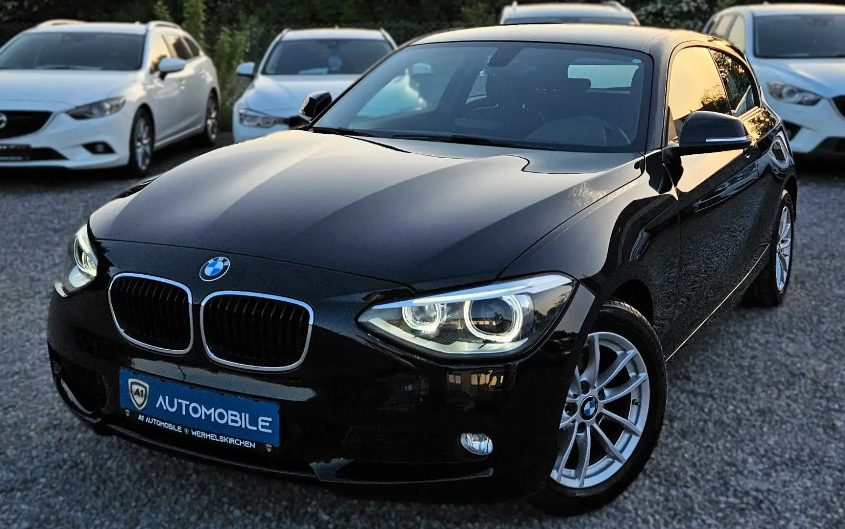 BMW 116 d°BI-XENON°NAVI°TEMPOMAT°SHZ°SCHECKHEFT° Schwarz - 1