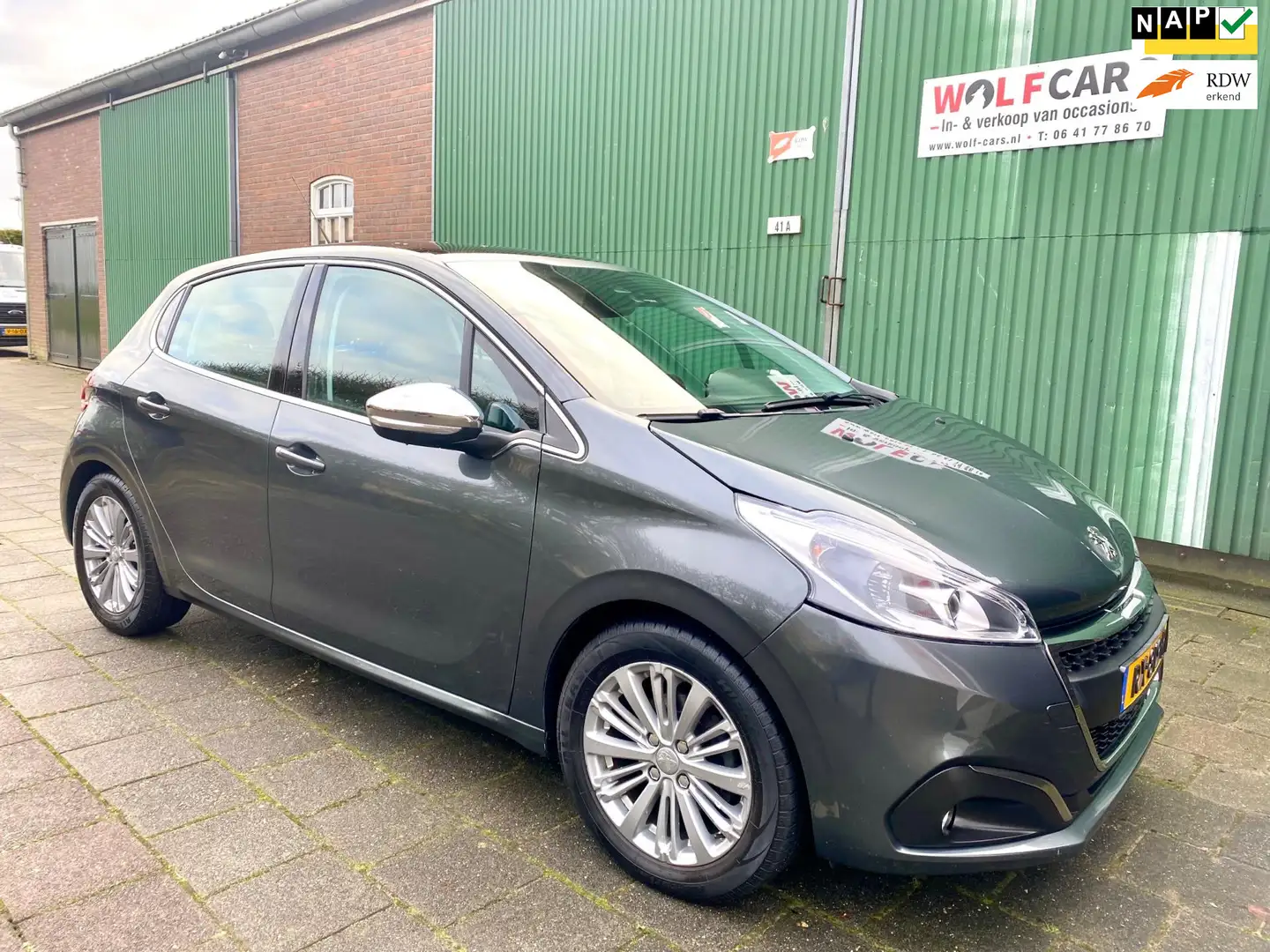 Peugeot 208 1.2 PureTech | Panoroma Dak | Navigatie | Airco Grijs - 1