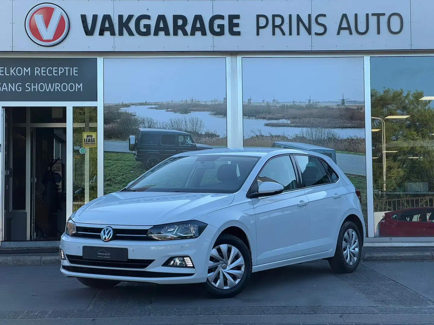 Volkswagen Polo 1.0 TSI Comfortline |NAVI|PARK SENSOREN|MULTI STUU Wit - 1