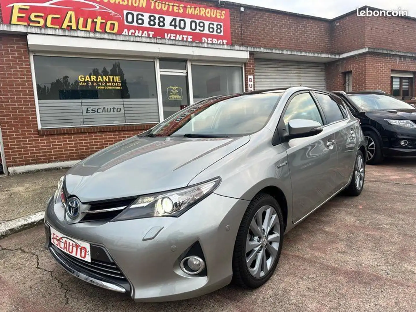 Toyota Auris 1,8 HYBRID 136h TOUTES OPTIONS - 1
