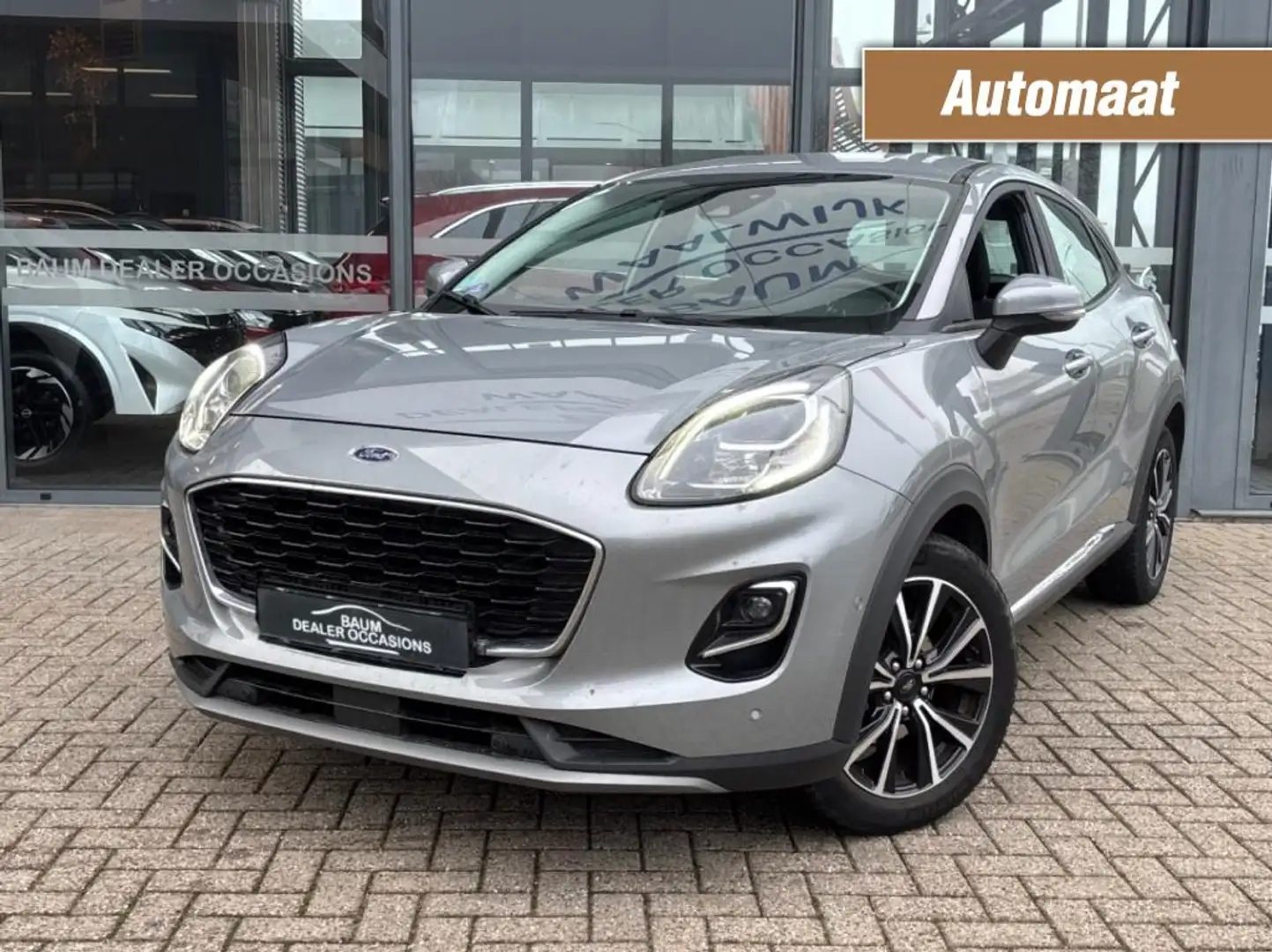 Ford Puma 1.0 EB HYB. TITANUIM. X AUTOMAAT NAVI LMV PDC-CAME Grijs - 1