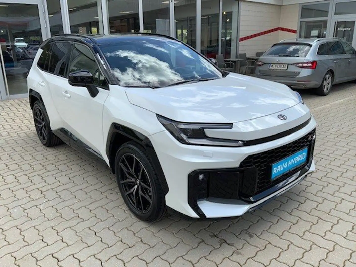 Toyota RAV 4 RAV4 2.5 Hybrid 143 kW AWD GR Sport neues MODELL Weiß - 1