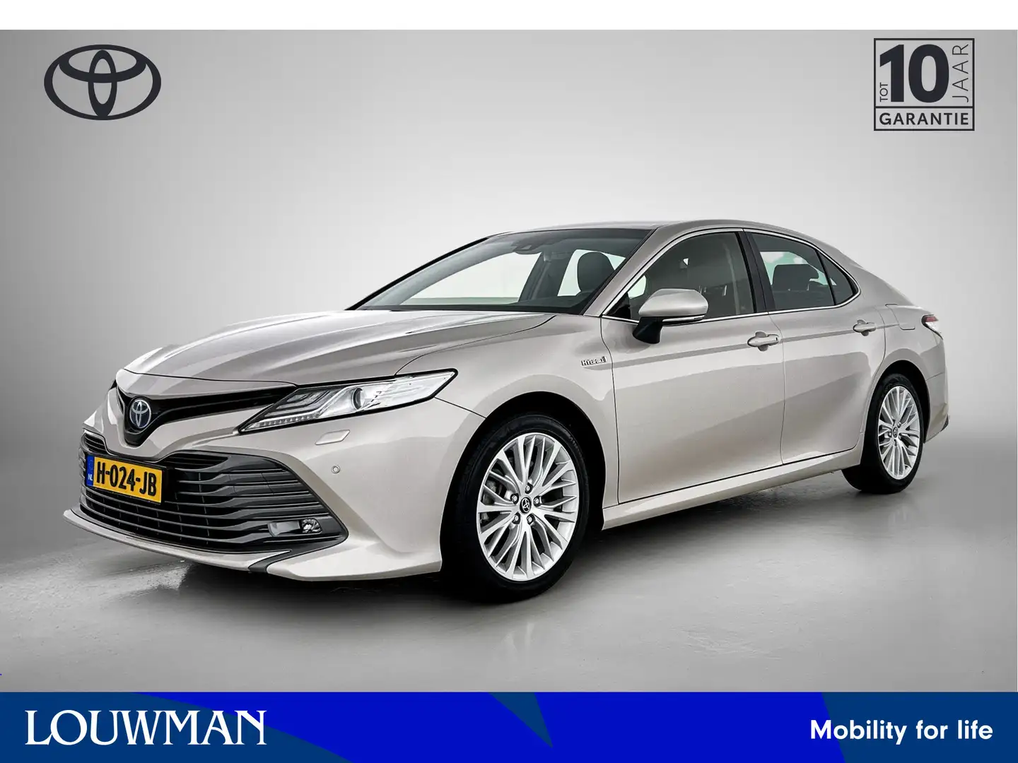 Toyota Camry 2.5 Hybrid Executive | 1e Eigenaar | Nieuw Gelever Bruin - 1