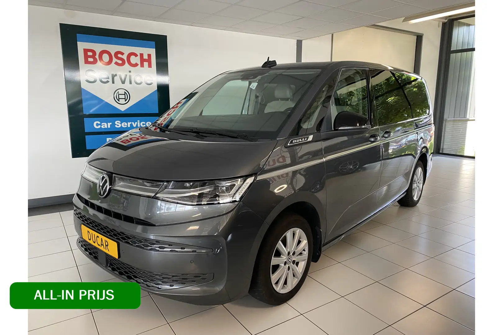 Volkswagen T7 Multivan 1.4 eHybrid L2H1 Style Bully DSG 7 pers / Panorama Grau - 1