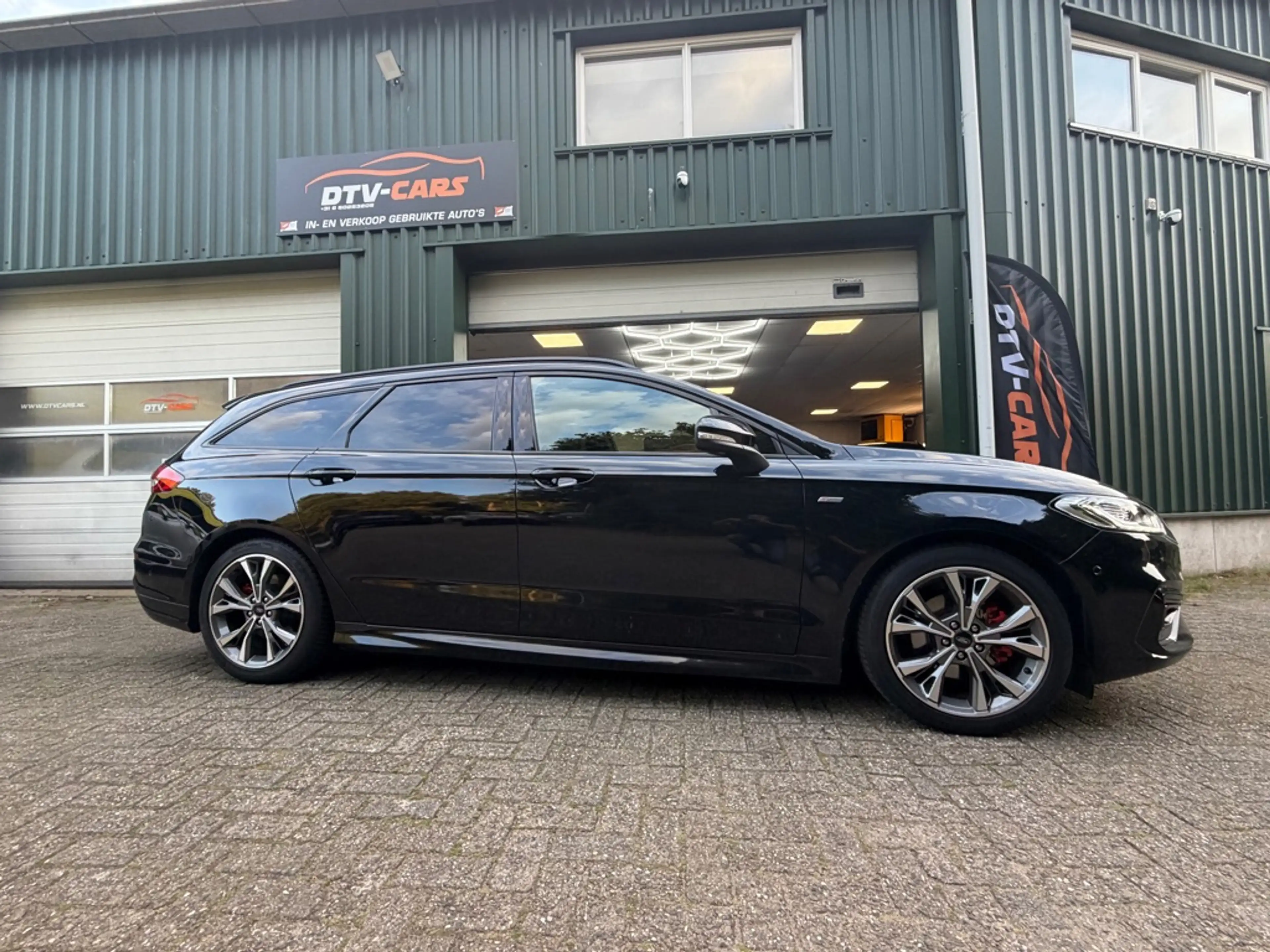 Ford Mondeo Wagon 2.0 IVCT HEV Titanium ST line Pano Full opti — photo 7